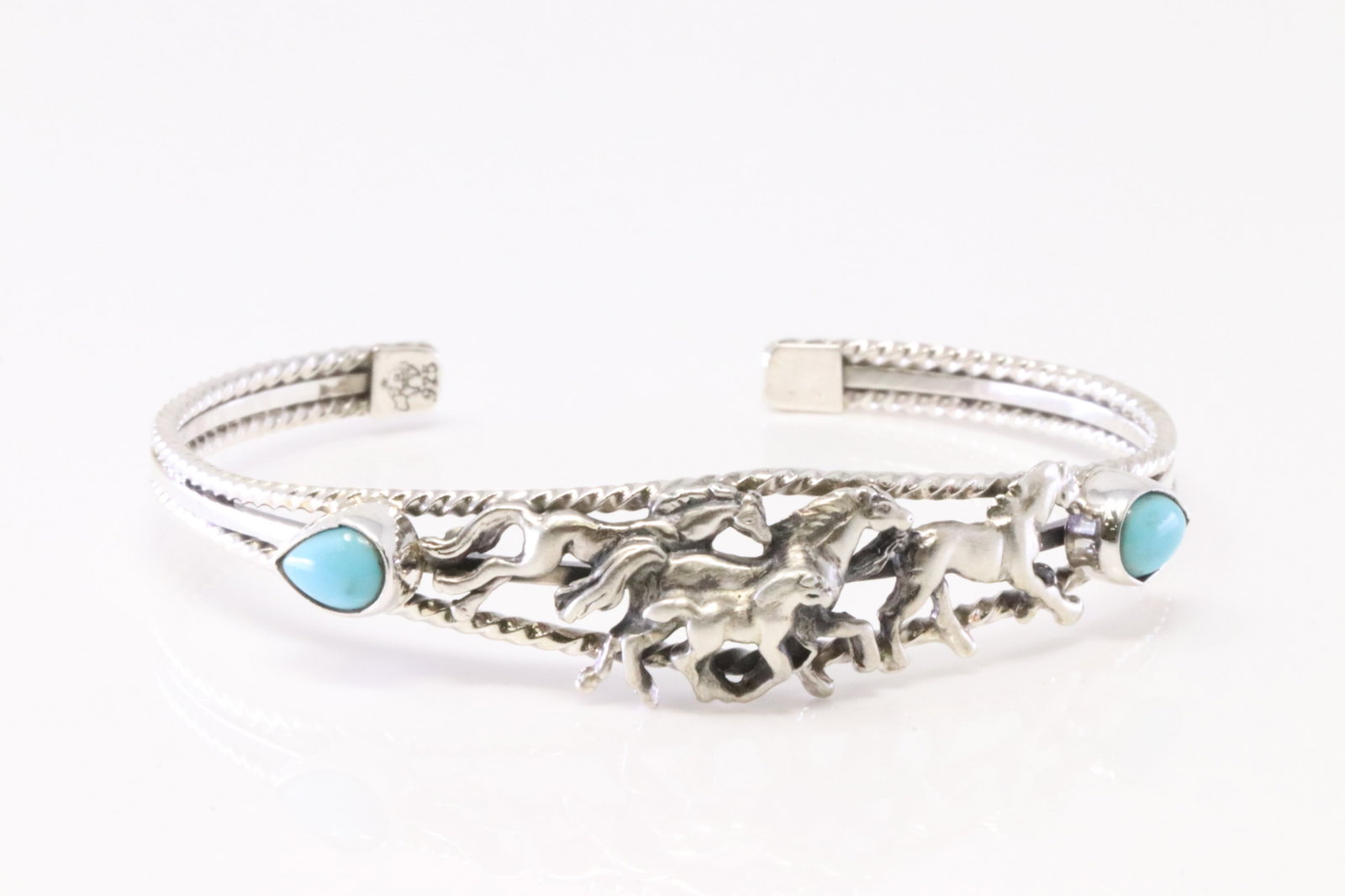 Native America Navajo Sterling Silver Turquoise Horse Bracelet Cuff By Bobby Platero.: This is a Native America Navajo Sterling Silver Turquoise Horse Bracelet Cuff By Bobby Platero.