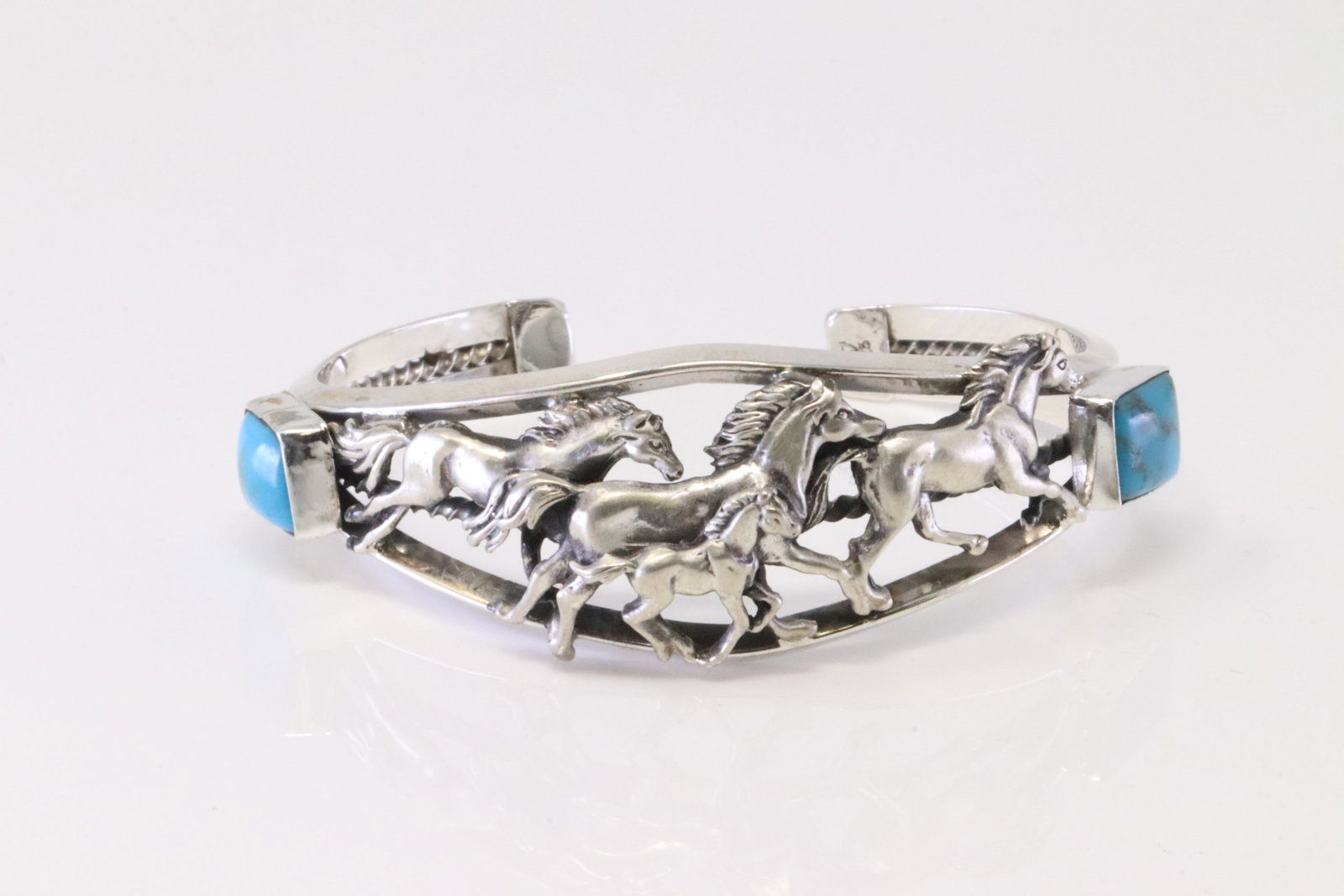Native America Navajo Sterling Silver Turquoise Horse Bracelet Cuff By Bobby Platero.: This is a Native America Navajo Sterling Silver Turquoise Horse Bracelet Cuff By Bobby Platero.