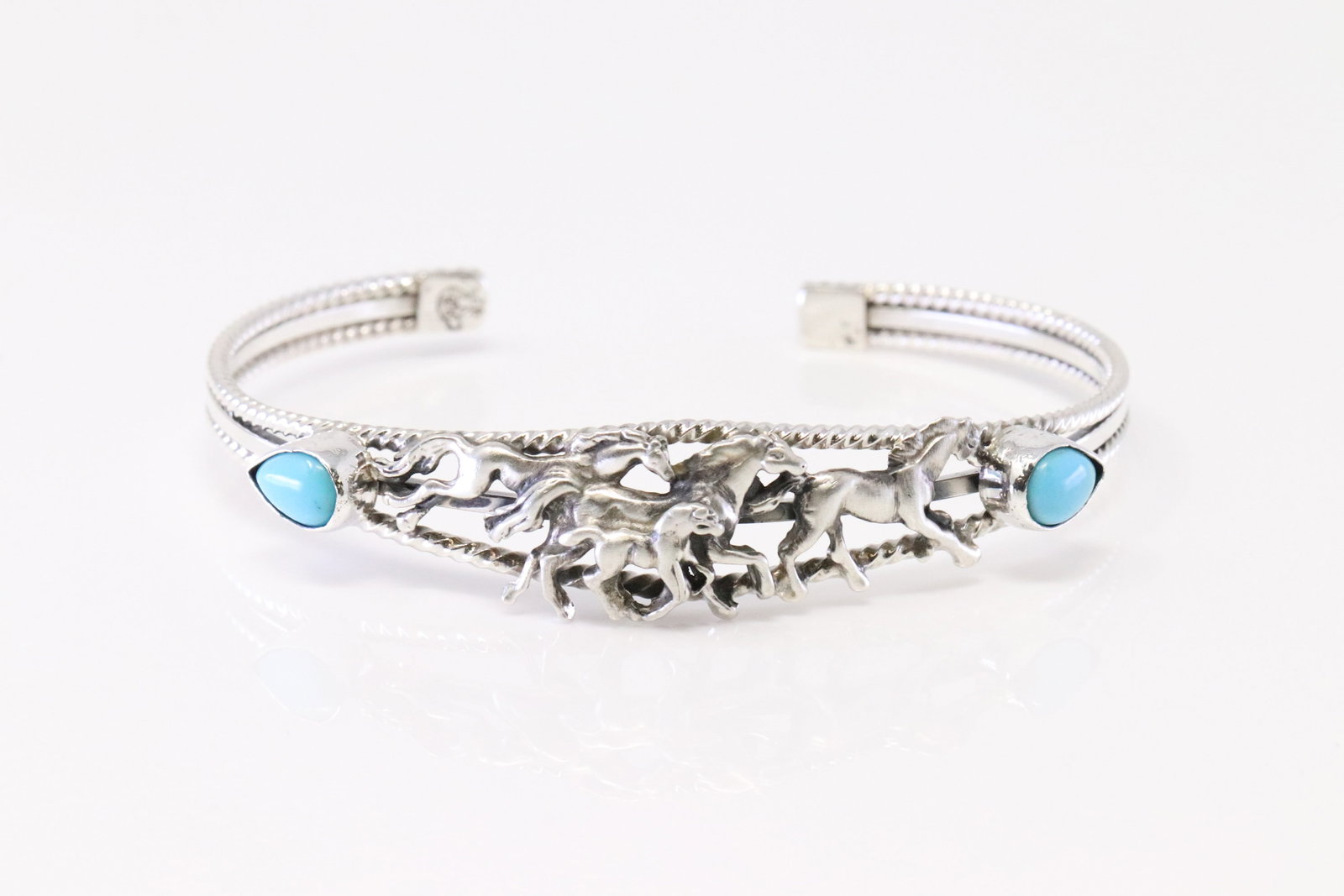 Native America Navajo Sterling Silver Turquoise Horse Bracelet By Bobby Platero.: This is a Native America Navajo Sterling Silver Turquoise Horse Bracelet By Bobby Platero.