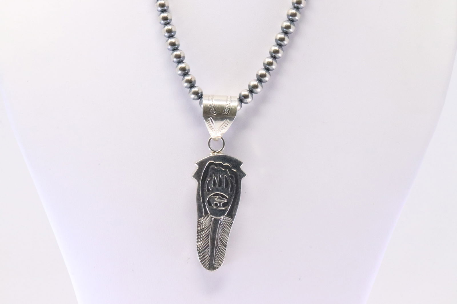 Native America Navajo Sterling Silver Bear Paw Pendant By A.Mariano. With Pearl Beaded Sterling: This is a Native America Navajo Sterling Silver Bear Paw Pendant By A.Mariano. With Pearl Beaded Sterling Silver Machine Made Necklace. Necklace length: