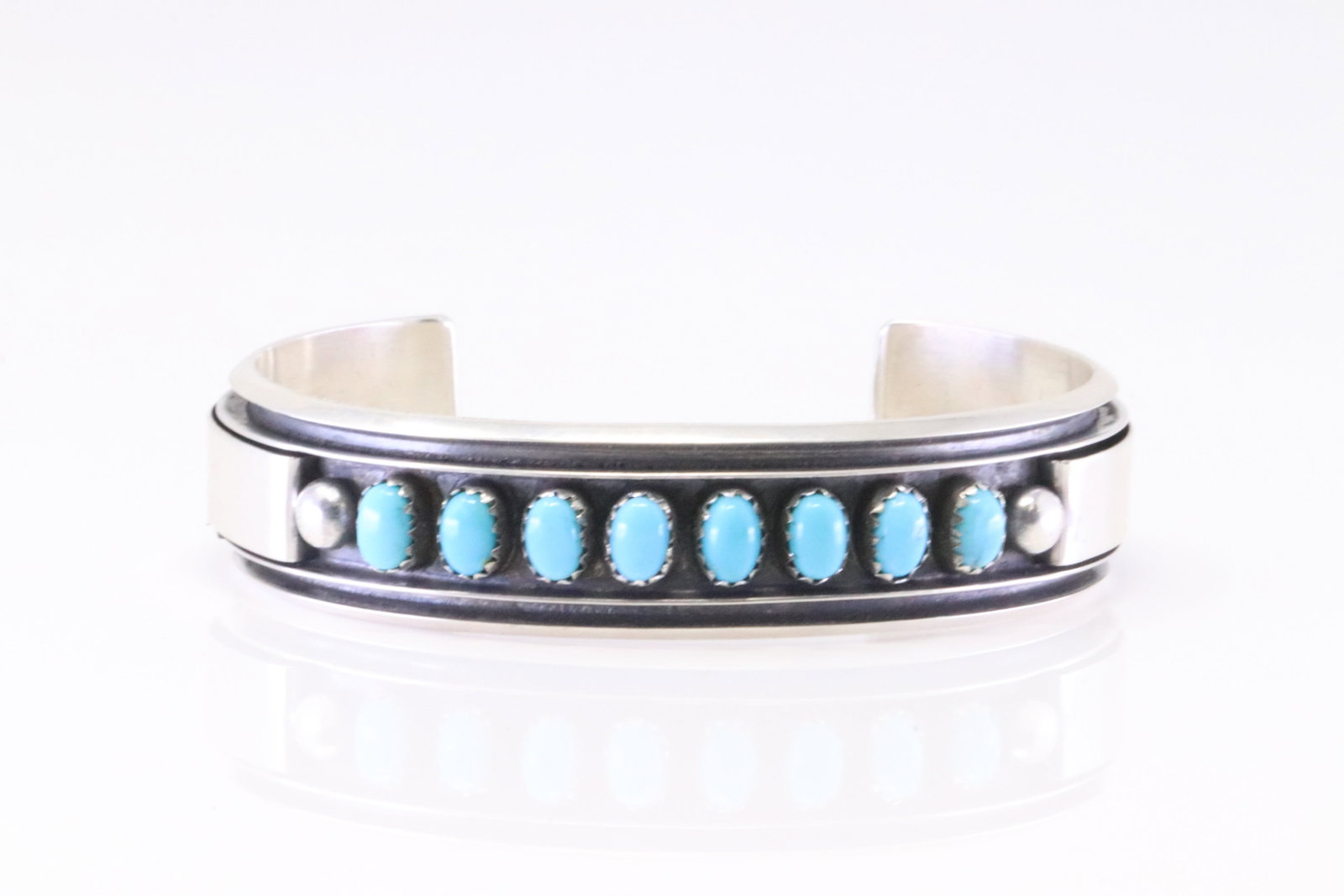 Native America Navajo Sterling Silver Kingman Turquoise Bracelet By Calvin James.: This is a Native America Navajo Sterling Silver Kingman Turquoise Bracelet By Calvin James.