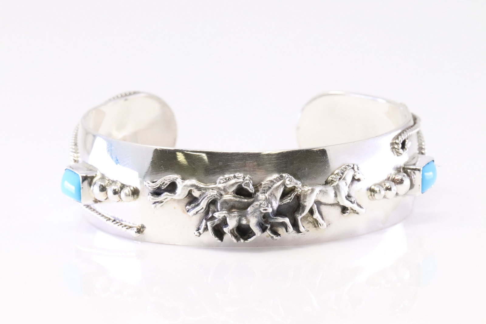 Native America Navajo Sterling Silver Turquoise Horse Bracelet Cuff By Bobby Platero.: This is a Native America Navajo Sterling Silver Turquoise Horse Bracelet Cuff By Bobby Platero.