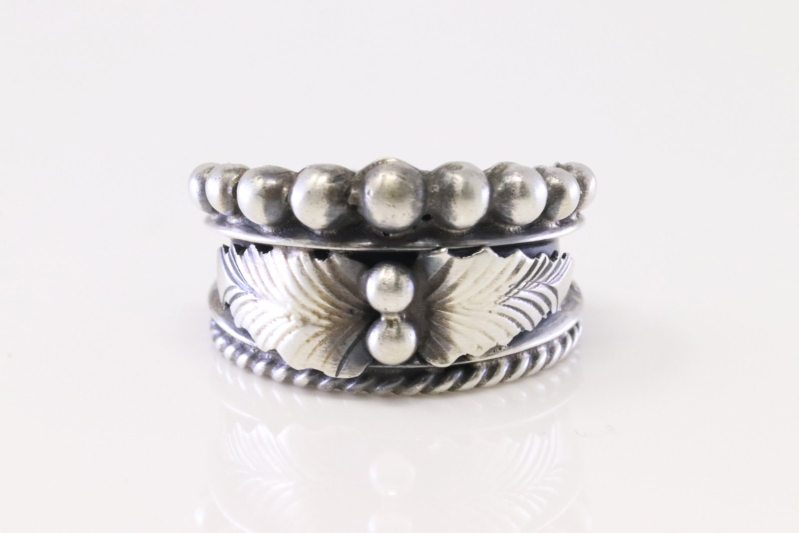 Native American Navajo Sterling Silver Ring By Tom Lewis.: This is a Native American Navajo Sterling Silver Ring By Tom Lewis. Ring size: 7.00.