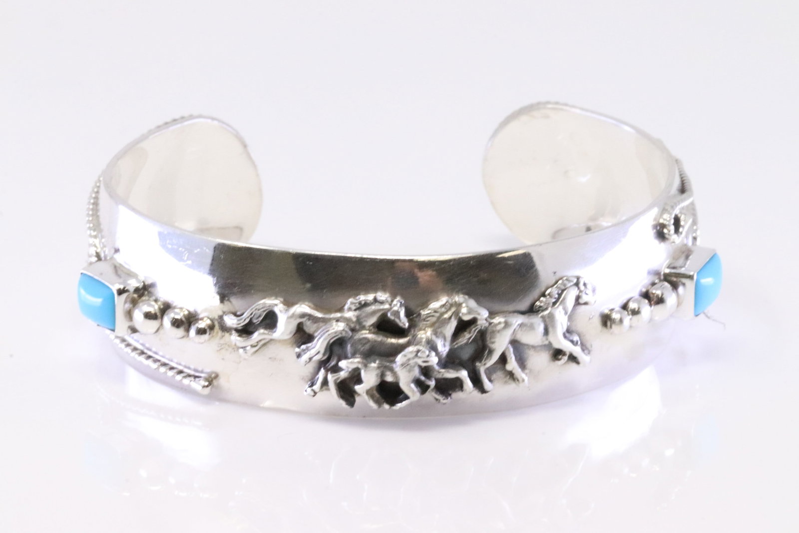 Native American Navajo Sterling Silver Turquoise Horse Bracelet Cuff By Bobby Platero.: This is a Native American Navajo Sterling Silver Turquoise Horse Bracelet Cuff By Bobby Platero.