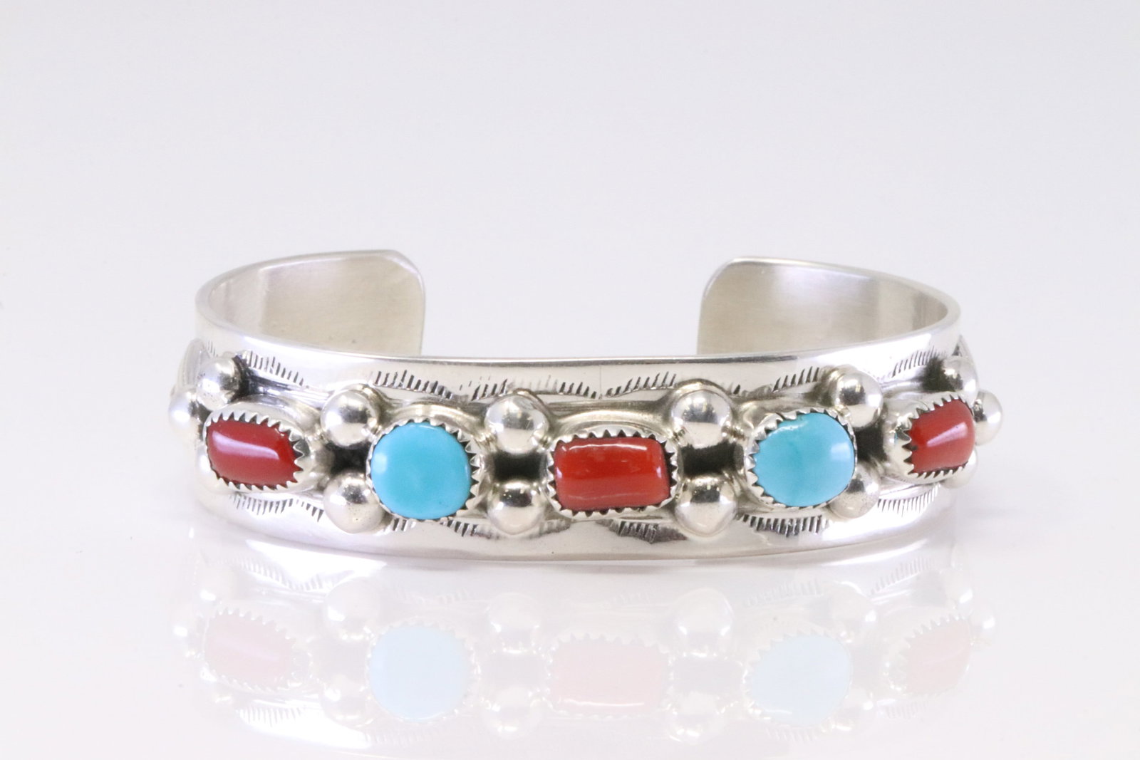 Native America Navajo Sterling Silver Coral & Turquoise Bracelet By Welbert Meyers.: This is a Native America Navajo Sterling Silver Coral & Turquoise Bracelet By Welbert Meyers.