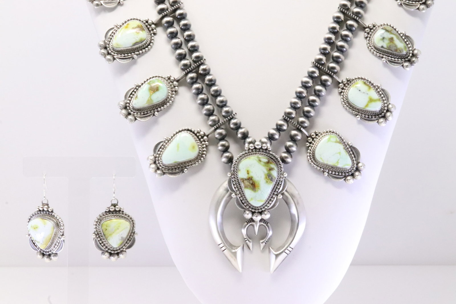 Native America Navajo Sterling Silver Palomino Naja Necklace & Earring's Set By Tom Lewis.: This is a Native America Navajo Sterling Silver Palomino Naja Necklace & Earring's Set By Tom Lewis. Necklace length: 24.00" Total weight: 208.90 Grams.