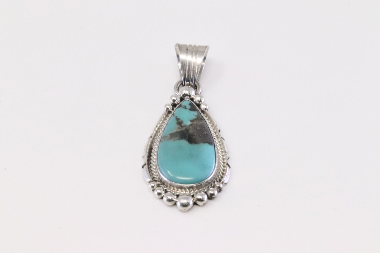 Native America Navajo Sterling Silver Turquoise Pendant By Samuel Yellowhair.: This is a Native America Navajo Sterling Silver Turquoise Pendant By Samuel Yellowhair.