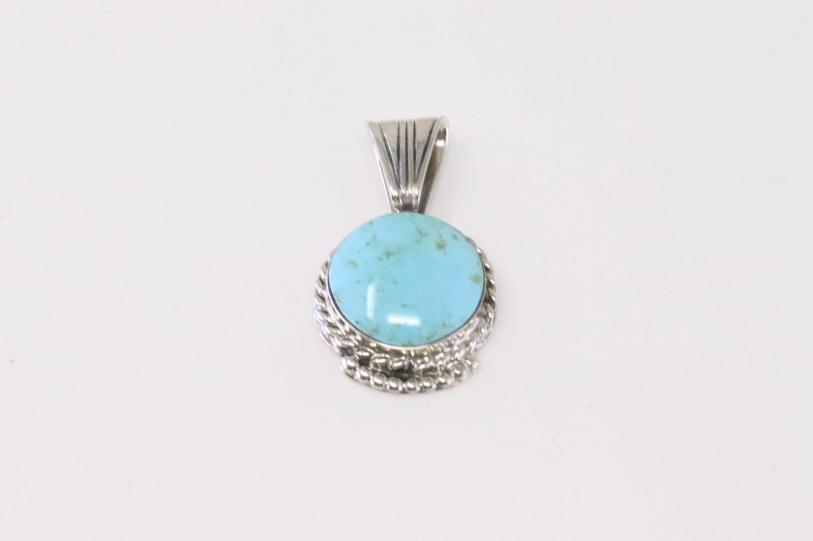 Native America Navajo Sterling Silver Turquoise Pendant By Mike Smith.: This is a Native America Navajo Sterling Silver Turquoise Pendant By Mike Smith.