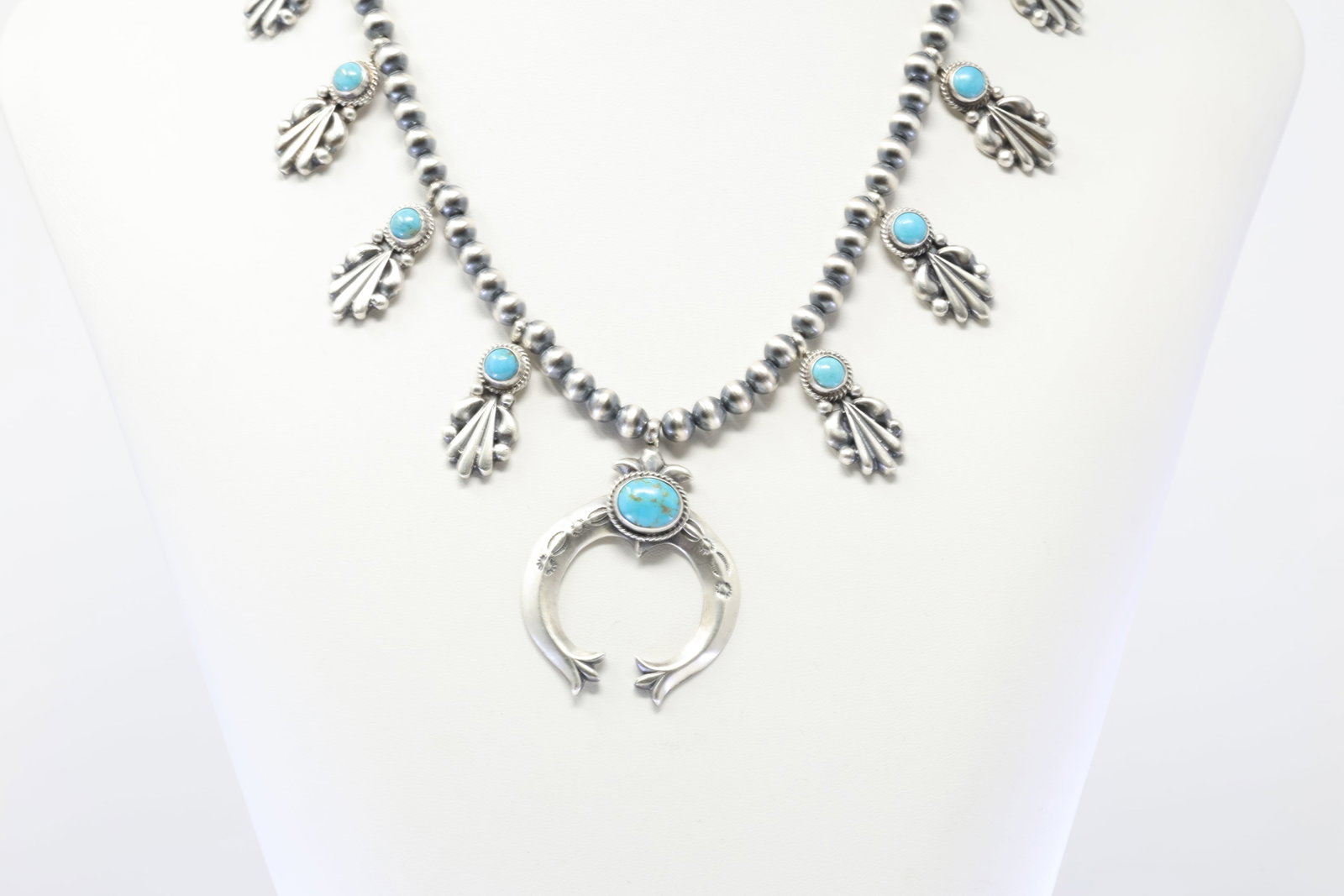 Native America Navajo Sterling Silver Turquoise Squash Blossom Necklace By Bobby Platero.: This is a Native America Navajo Sterling Silver Turquoise Squash Blossom Necklace By Bobby Platero. Necklace length: 18.00"