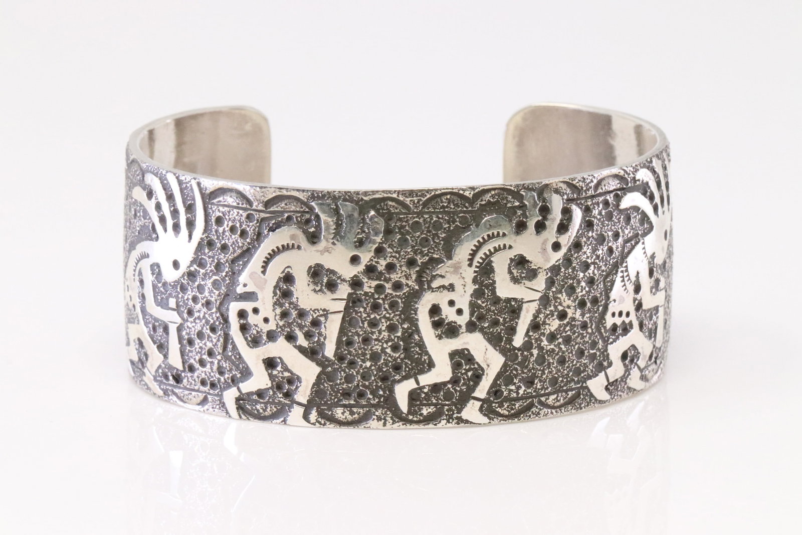 Native America Navajo Sterling Silver Kokopelli Bracelet Cuff By Ray Begay.: This is a Native America Navajo Sterling Silver Kokopelli Bracelet Cuff By Ray Begay.