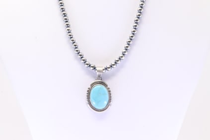 Native America Navajo Sterling Silver Kingman Turquoise Pendant By Freida Martinez. With Pearl