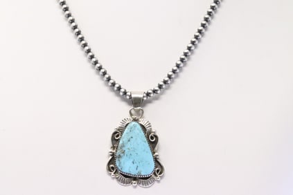 Native America Navajo Sterling Silver Kingman Turquoise Pendant By Lionel Calladitto. With Pearl