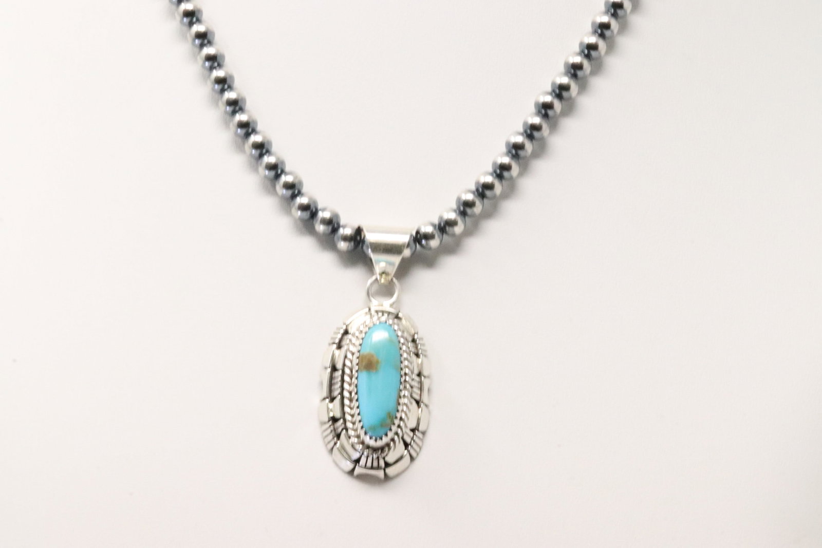 Native America Navajo Sterling Silver Kingman Turquoise Pendant By Pearl Beaded Sterling Silver: This is a Native America Navajo Sterling Silver Kingman Turquoise Pendant By Pearl Beaded Sterling Silver Machine Made Necklace. Necklace length: 16.00"