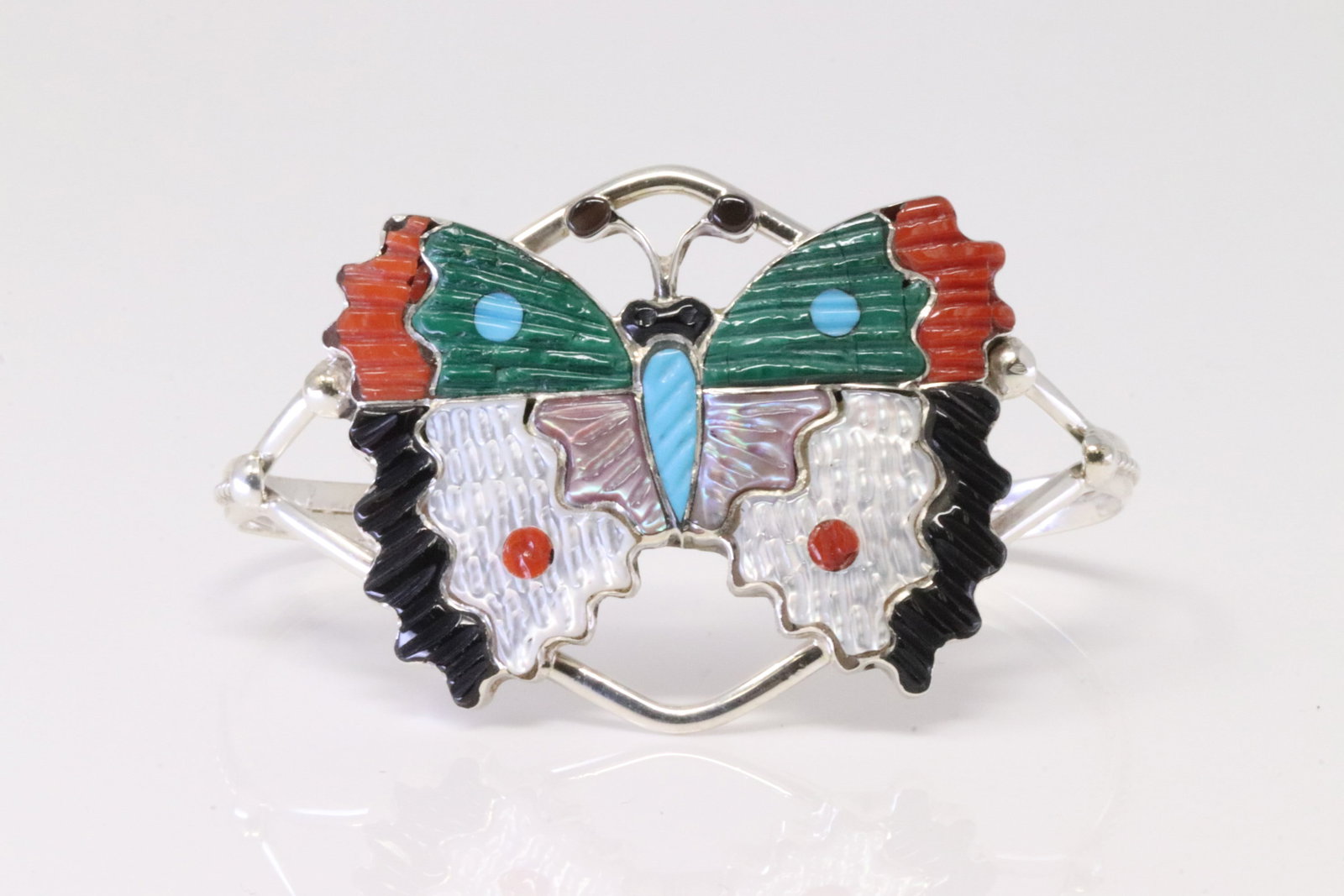 Native America Zuni Sterling Silver Multi-Color Inlay Bracelet By Tamara Pinto.: This is a Native America Zuni Sterling Silver Multi-Color Inlay Bracelet By Tamara Pinto.