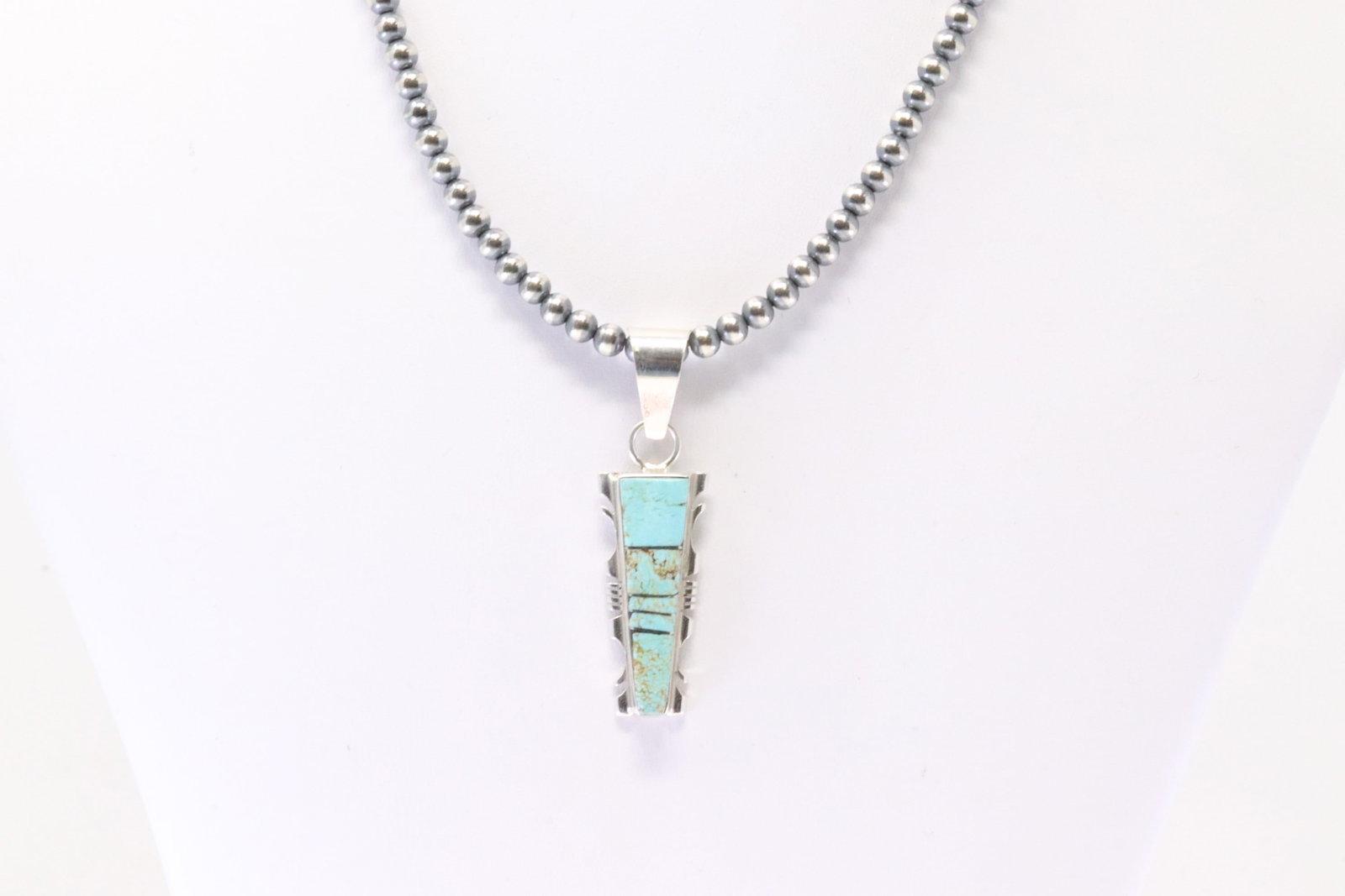 Native America Navajo Sterling Silver Turquoise Inlay Pendant By Steve Francisco. With Pearl Beaded: This is a Native America Navajo Sterling Silver Turquoise Inlay Pendant By Steve Francisco. With Pearl Beaded Sterling Silver Machine Made Necklace. Necklace length: 16.00"