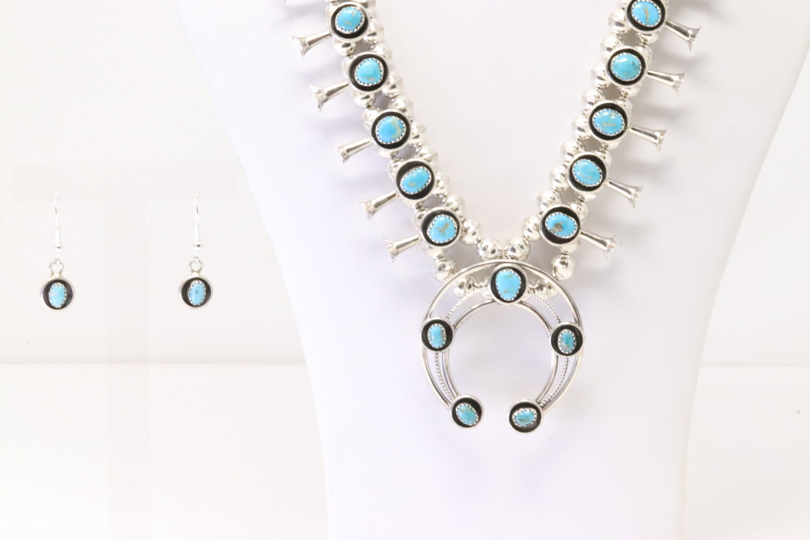 Native America Navajo Sterling Silver Turquoise Baby Squash Blossom Necklace & Earring's Set By P.G.: This is a Native America Navajo Sterling Silver Turquoise Baby Squash Blossom Necklace & Earring's Set By P.G. Necklace length: 20.00"