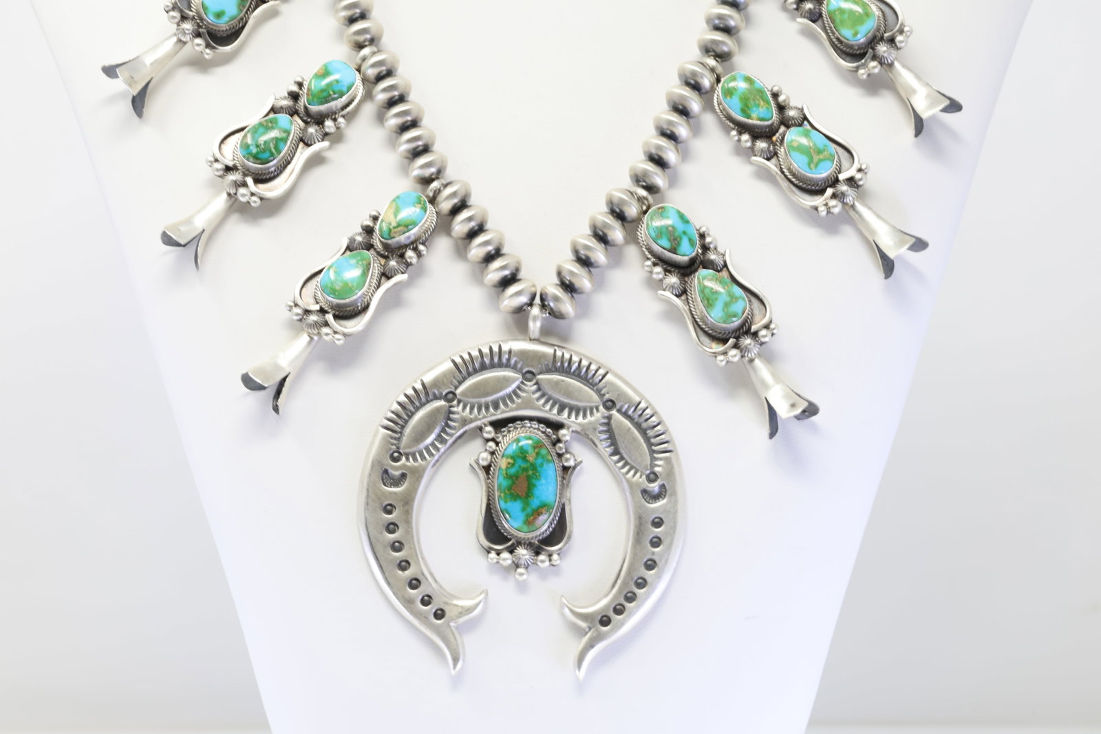 Native America Navajo Sterling Silver Sonora Gold Turquoise Squash Blossom Necklace By Tom Lewis.: This is a Native America Navajo Sterling Silver Sonora Gold Turquoise Squash Blossom Necklace By Tom Lewis. Necklace length: 20.00" Total weight: 161.00 Grams.