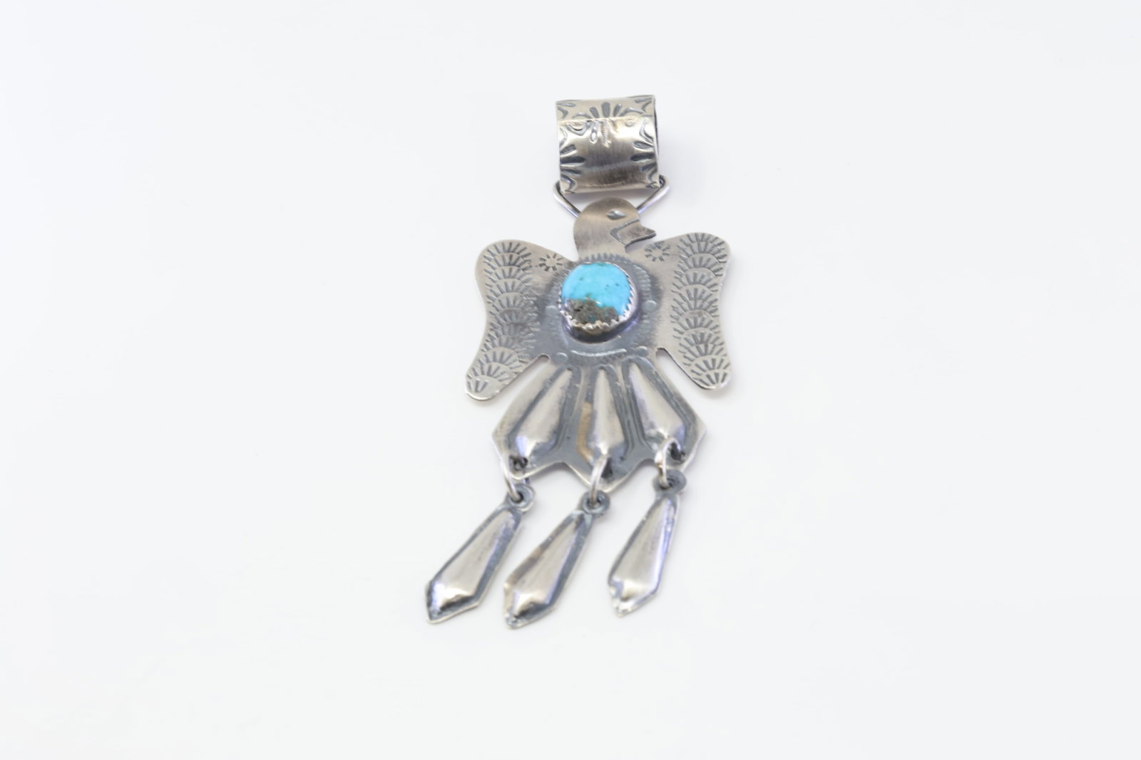 Native America Navajo Sterling Silver Turquoise Thunderbird Pendant By Tim Yazzie.: This is a Native America Navajo Sterling Silver Turquoise Thunderbird Pendant By Tim Yazzie.
