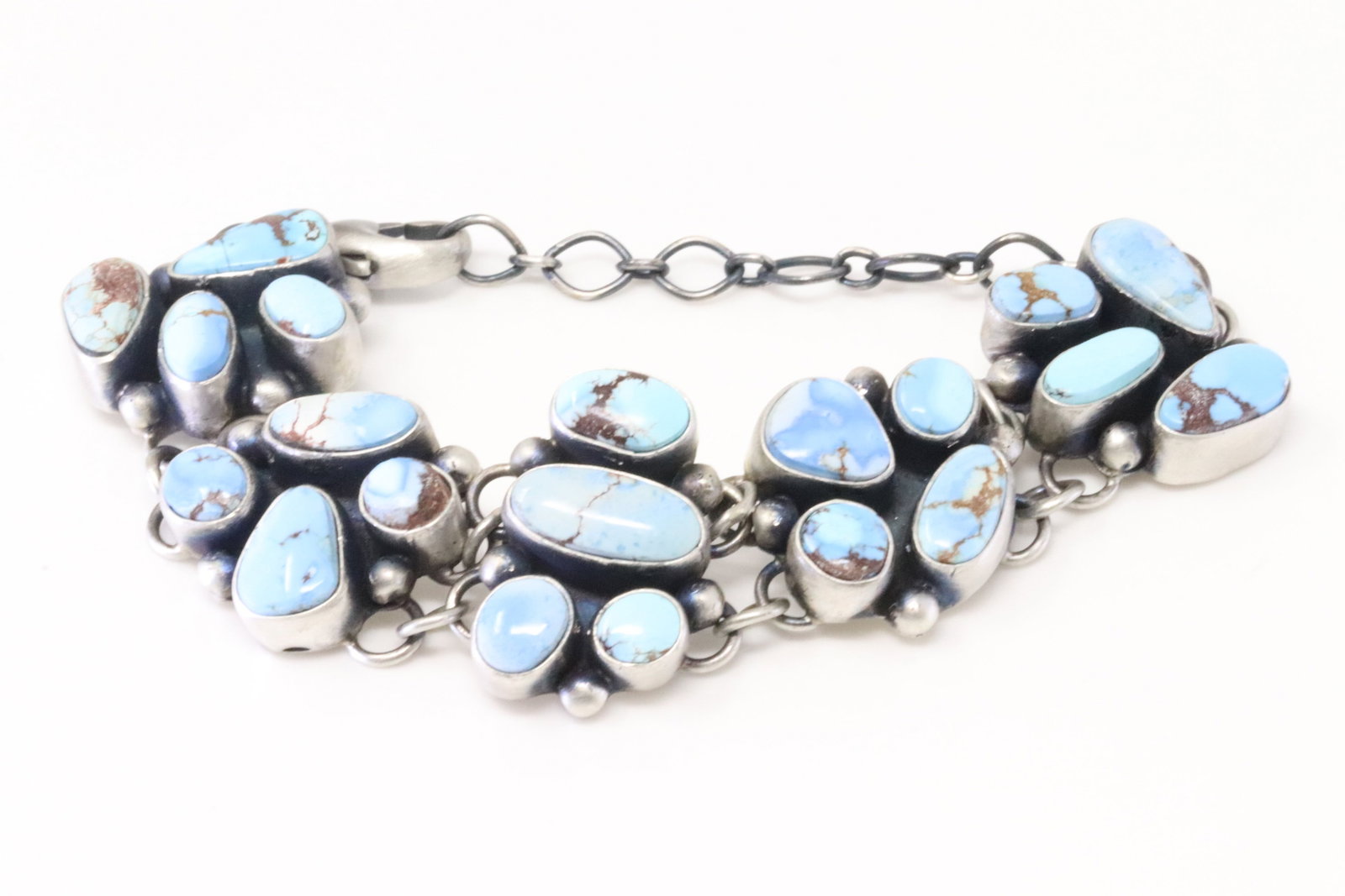 Native America Navajo Sterling Silver Golden Hill Turquoise Bracelet Link By Betty Tom.: This is a Native America Navajo Sterling Silver Golden Hill Turquoise Bracelet Link By Betty Tom. Bracelet length: 7.00" Adjustable.