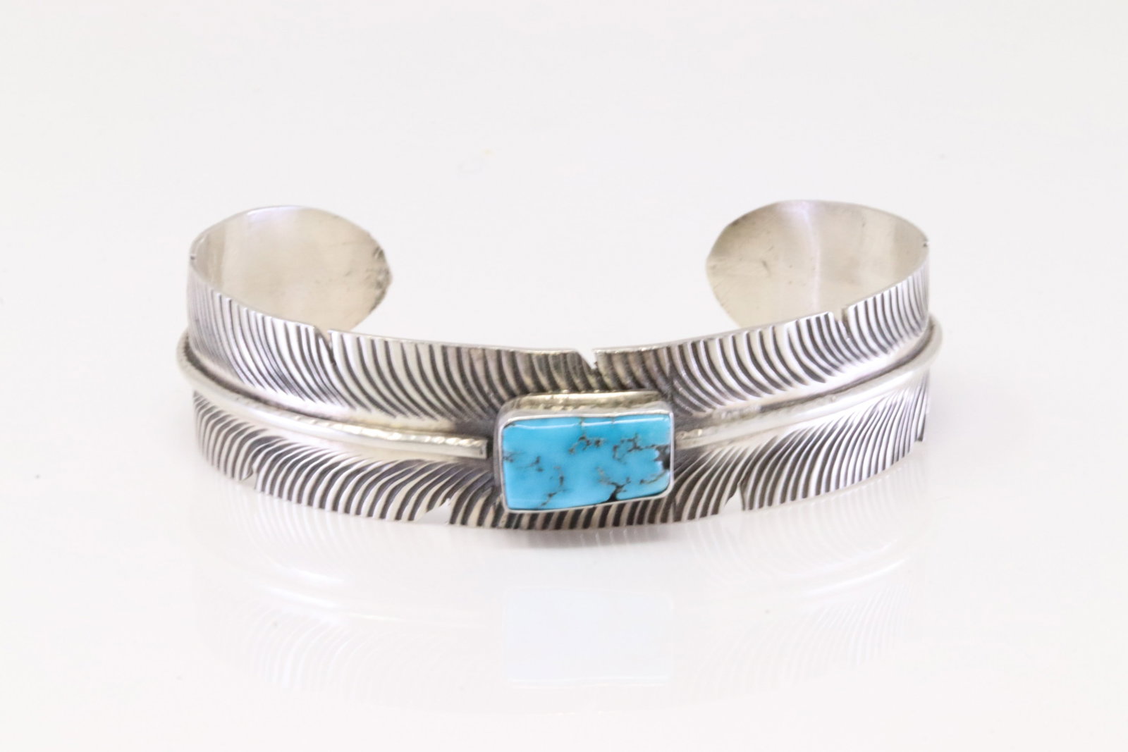 Native America Navajo Sterling Silver Turquoise Feather Bracelet By M.K.: This is a Native America Navajo Sterling Silver Turquoise Feather Bracelet By M.K.