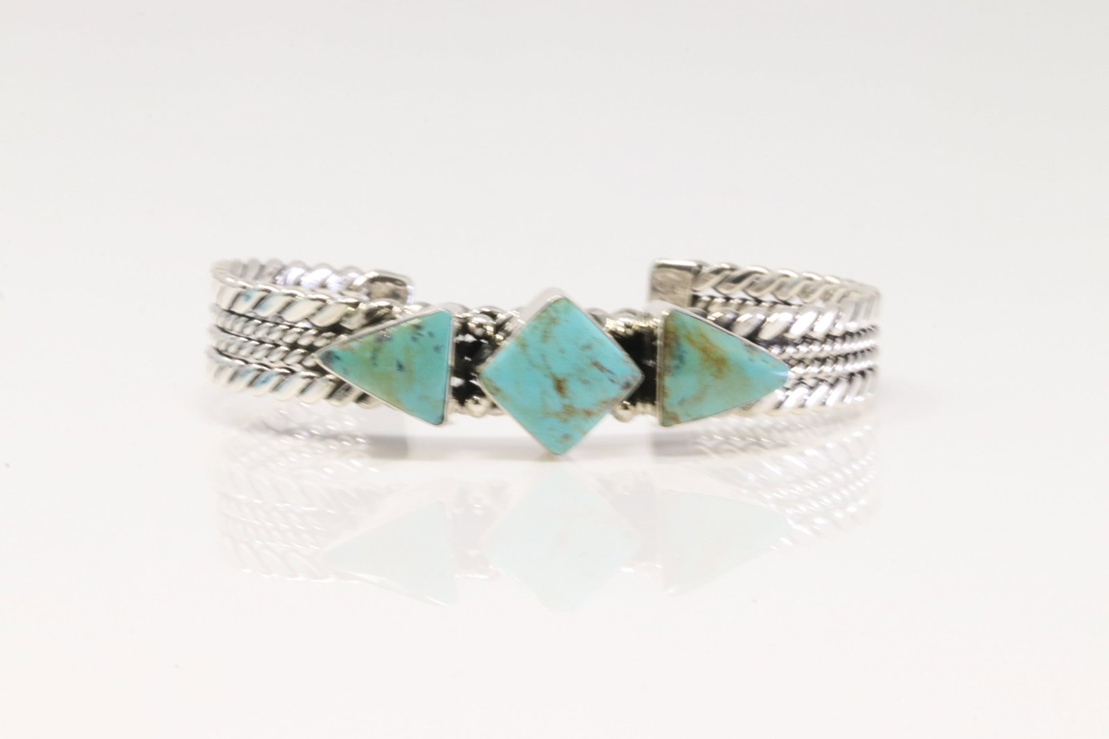 Native America Navajo Sterling Silver Turquoise Bracelet By Mike Smith.: This is a Native America Navajo Sterling Silver Turquoise Bracelet By Mike Smith.