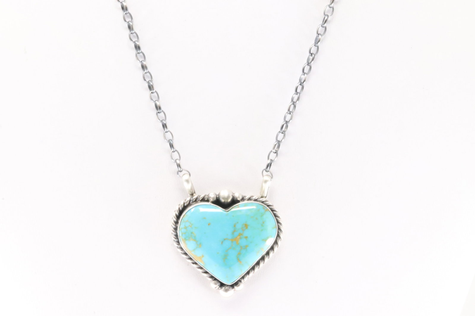 Native America Navajo Sterling Silver Kingman Turquoise Heart Necklace By Johnny Dixon.: This is a Native America Navajo Sterling Silver Kingman Turquoise Heart Necklace By Johnny Dixon. Necklace length: 16.00"