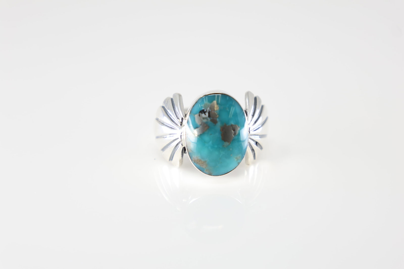 Native America Navajo Sterling Silver Turquoise Ring By Clarence Long.: This is a Native America Navajo Sterling Silver Turquoise Ring By Clarence Long. Ring size: 7.25.