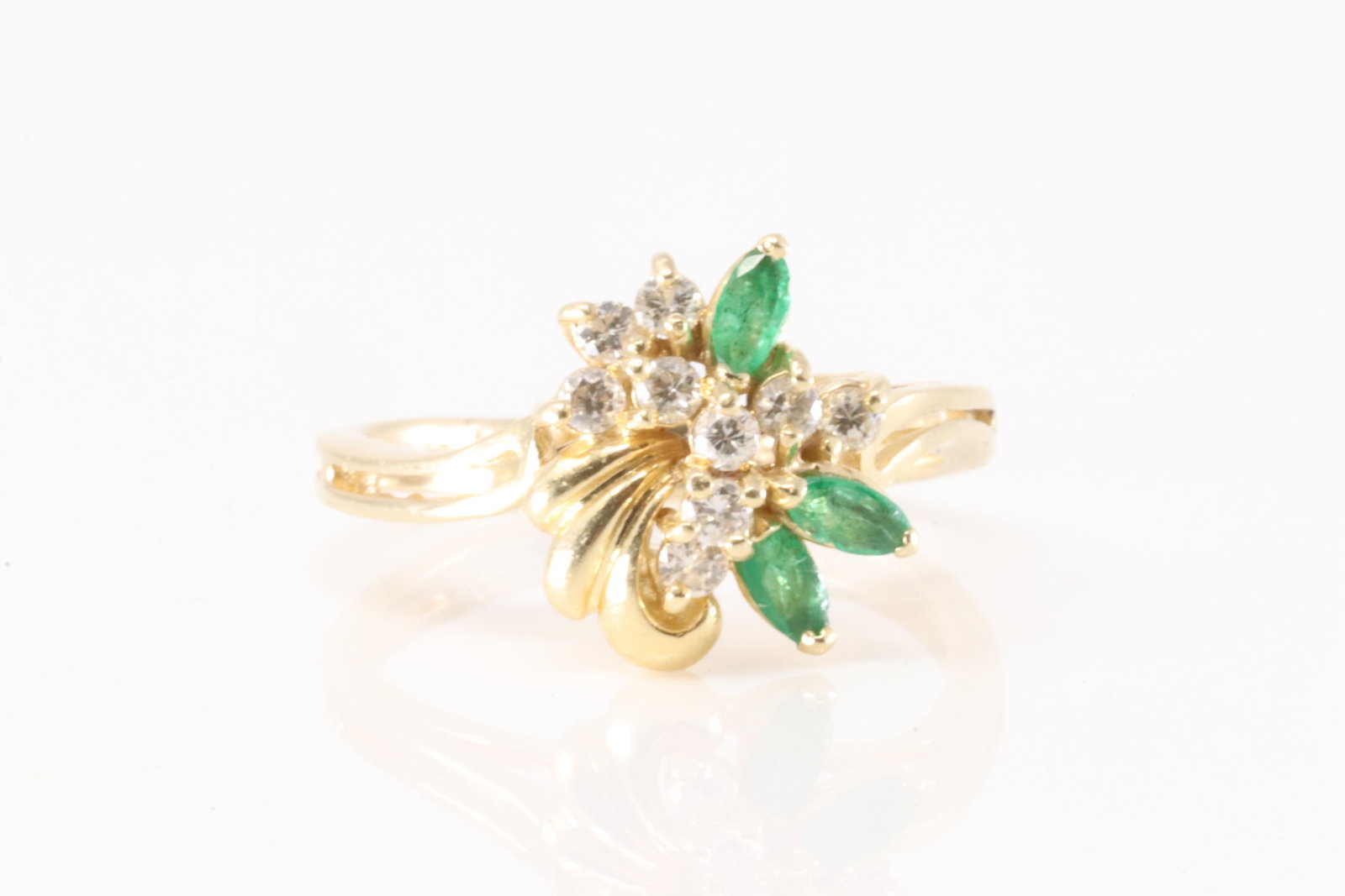 Emerald & Diamond Ring 14Kt.: Ladies 14Kt Yellow Gold Emerald & Diamond Ring. Ring has 3 marquise emerald with 9 round diamonds. Ring size: 5.50. Total weight: 3.40 Grams.