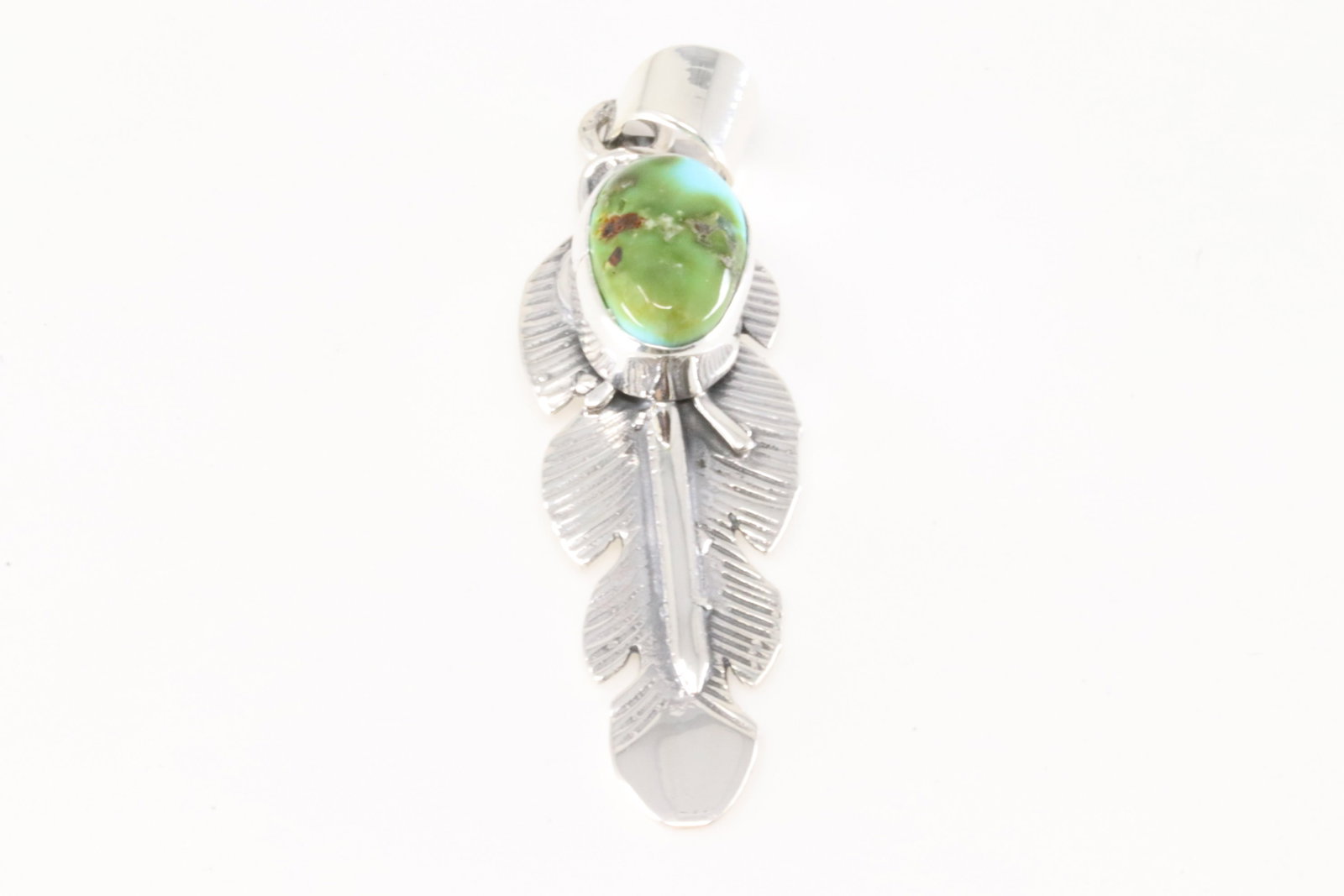 Native America Navajo Sterling Silver Sonora Gold Turquoise Feather Pendant By June Delgarito.: This is a Native America Navajo Sterling Silver Sonora Gold Turquoise Feather Pendant By June Delgarito.