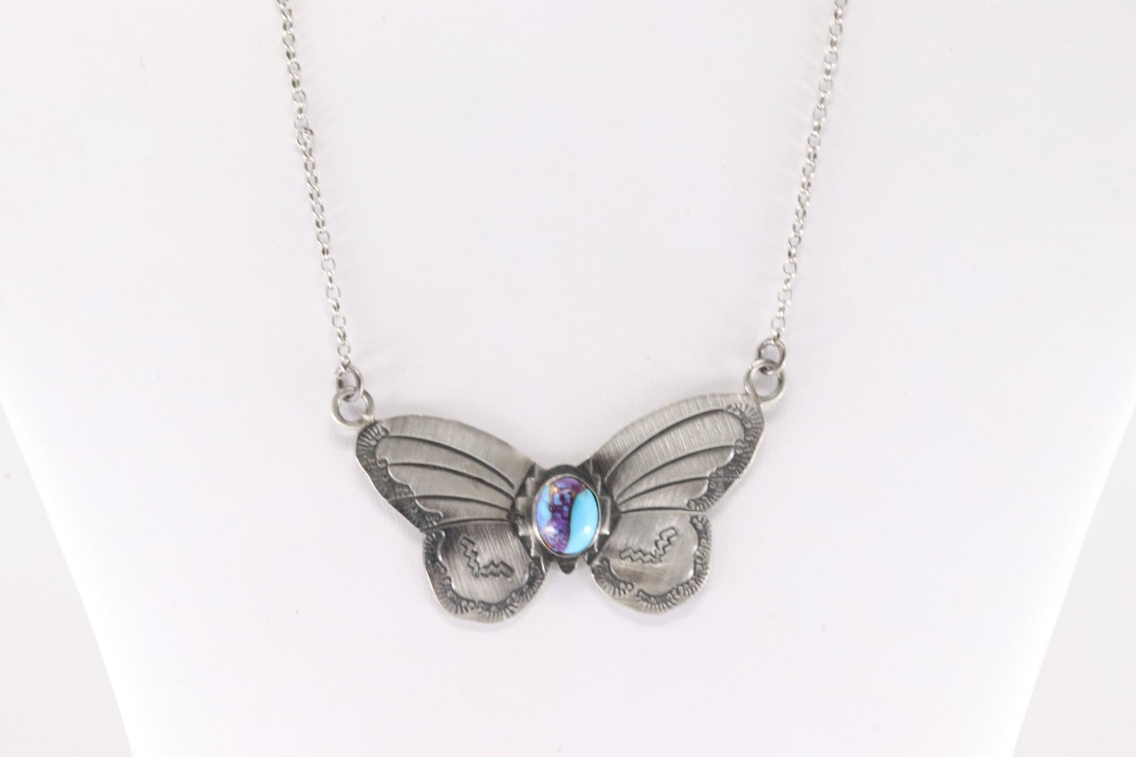 Native America Navajo Sterling Silver Turquoise Compressed Butterfly Necklace By Rick Enriquez.: This is a Native America Navajo Sterling Silver Turquoise Compressed Butterfly Necklace By Rick Enriquez. Necklace length: 16.00"