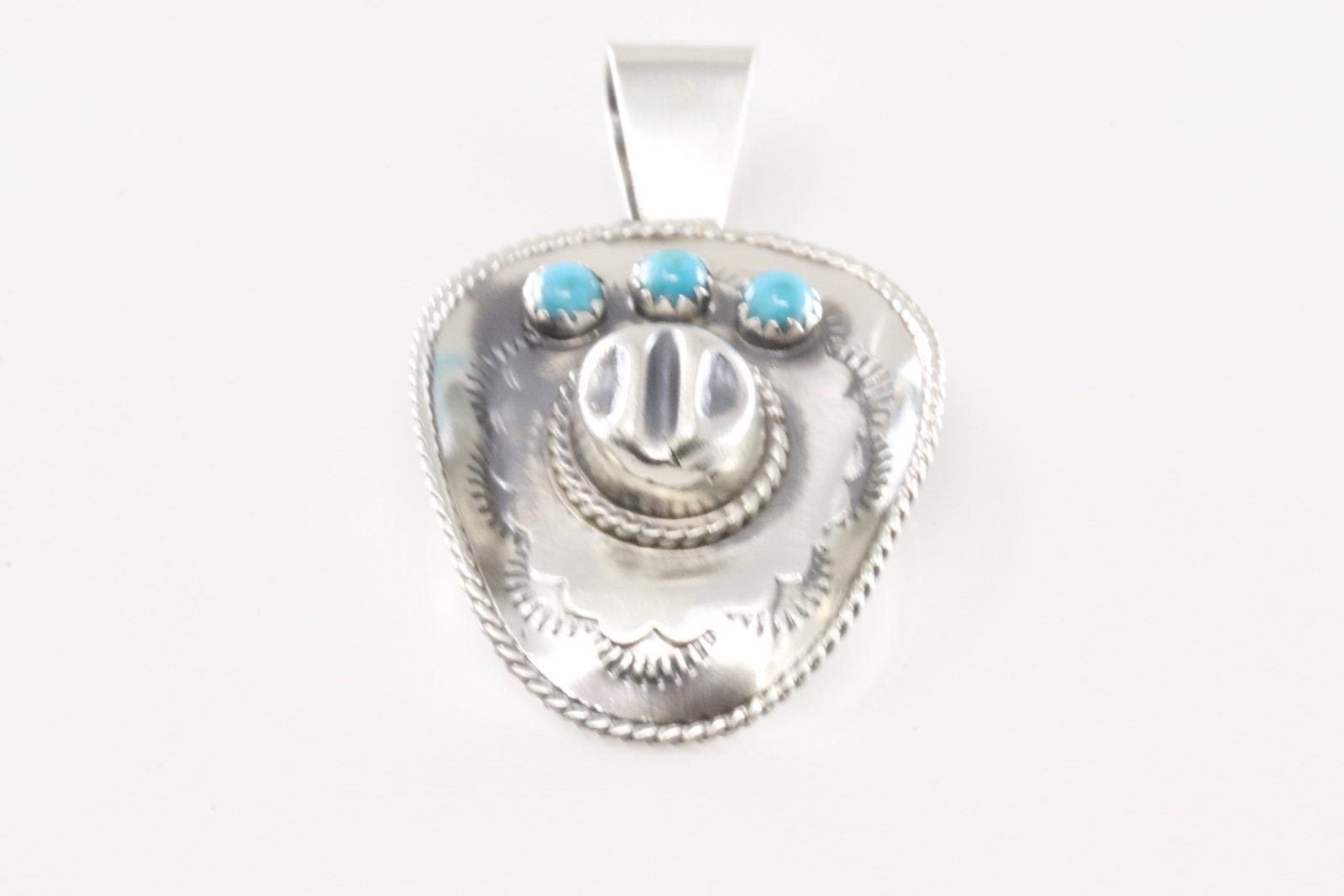 Native America Navajo Sterling Silver Turquoise Cowboy Hat Pendant By Bobby Platero.: This is a Native America Navajo Sterling Silver Turquoise Cowboy Hat Pendant By Bobby Platero.