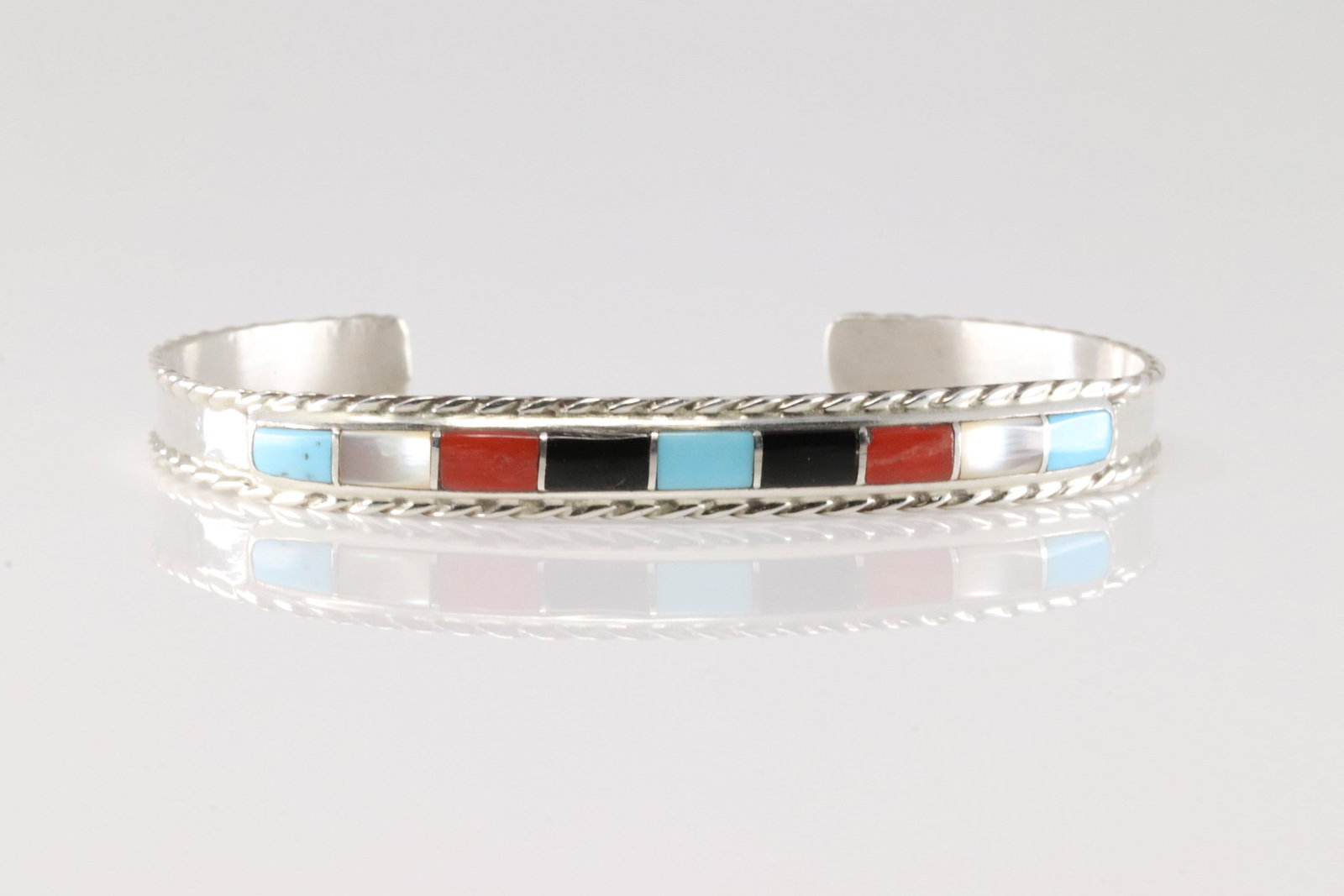 Native America Zuni Sterling Silver Multi-Color Stone Inlay Bracelet By Jessica Chavez.: This is a Native America Zuni Sterling Silver Multi-Color Stone Inlay Bracelet By Jessica Chavez.