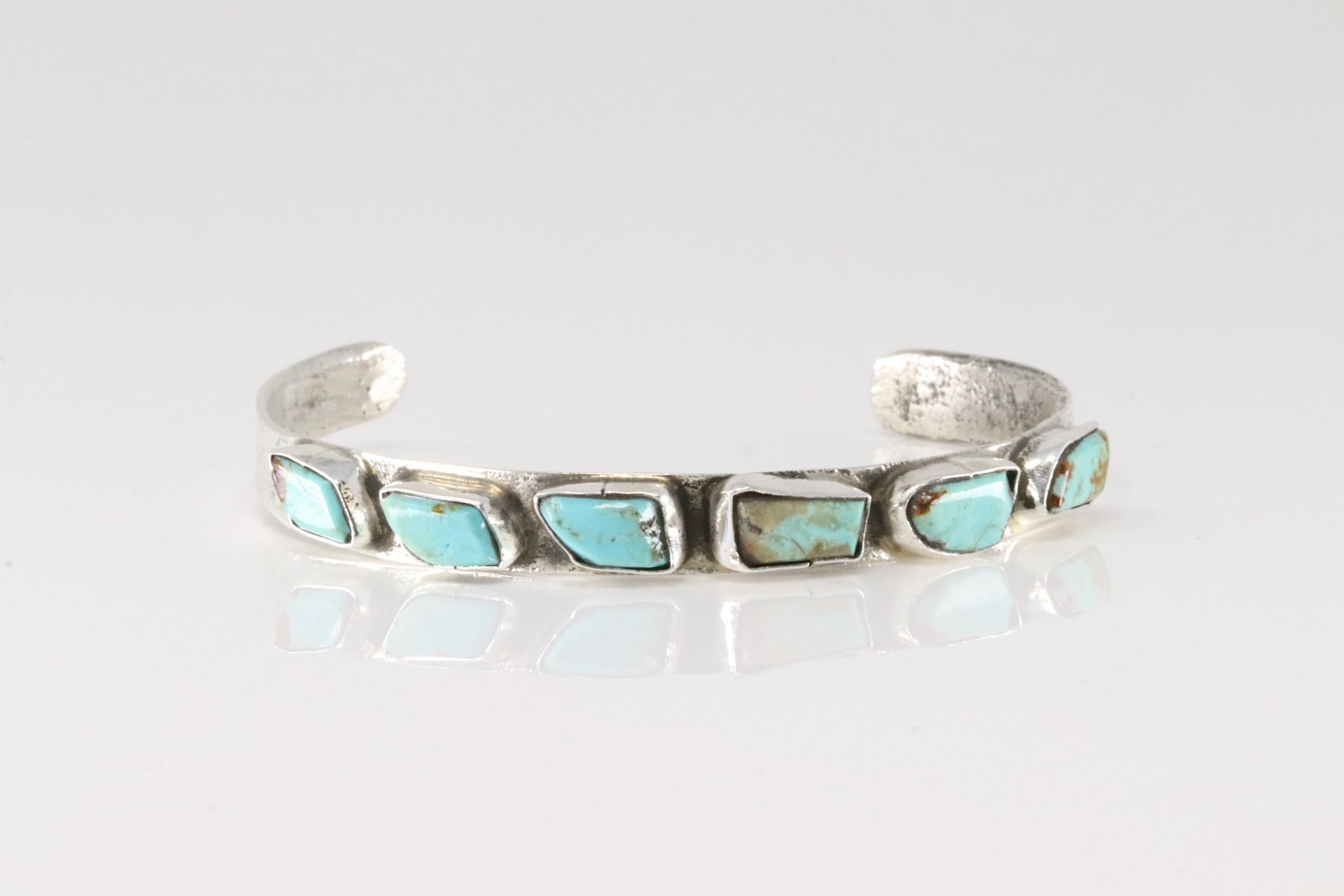 Native America Zuni Sterling Silver Turquoise Barcelet Cuff By Jude Candelaria.: This is a Native America Zuni Sterling Silver Turquoise Barcelet Cuff By Jude Candelaria.