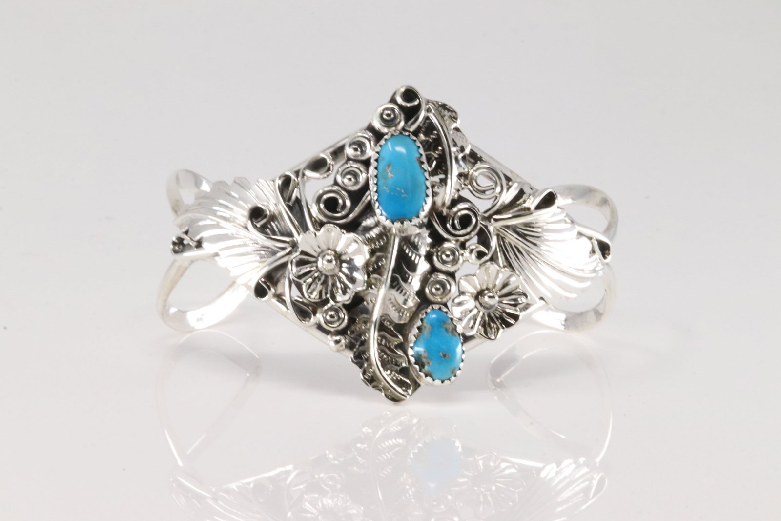 Native America Navajo Sterling Silver Turquoise Bracelet Floral Cuff By Harry B.Yazzie.: This is a Native America Navajo Sterling Silver Turquoise Bracelet Floral Cuff By Harry B.Yazzie.