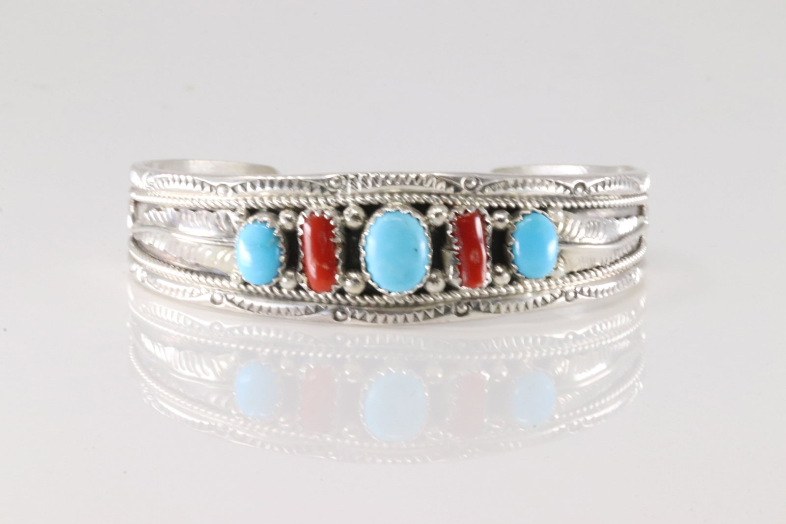 Native America Navajo Sterling Silver Coral & Turquoise Bracelet Cuff By Harrison & Betty Begaye.: This is a Native America Navajo Sterling Silver Coral & Turquoise Bracelet Cuff By Harrison & Betty Begaye.