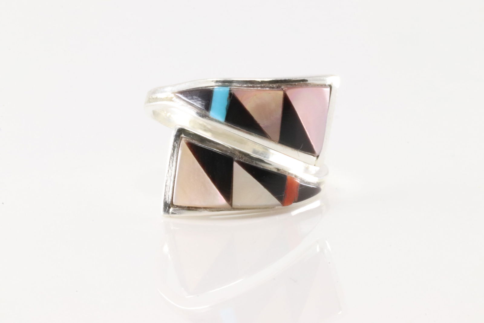 Native America Zunio Sterling Silver Multi-Color Stone Inlay Ring By Tammie Qualo.: This is a Native America Zunio Sterling Silver Multi-Color Stone Inlay Ring By Tammie Qualo. Ring size: 8.25. Adjustable.