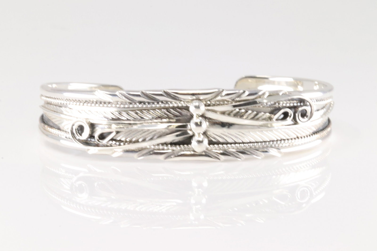 Native America Navajo Sterling Silver Feather Bracelet Cuff By Darrell Morgan.: This is a Native America Navajo Sterling Silver Feather Bracelet Cuff By Darrell Morgan.