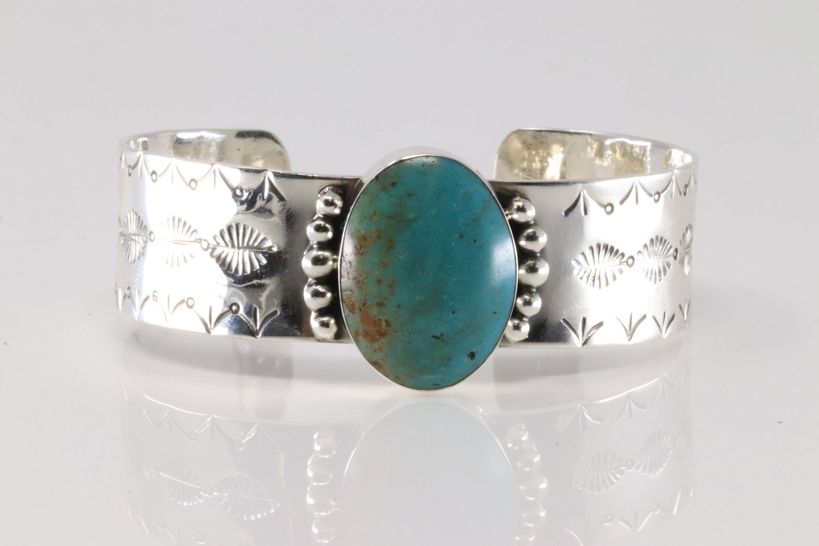 Native America Navajo Sterling Silver Turquoise Bracelet Cuff By Daniel Dakai.: This is a Native America Navajo Sterling Silver Turquoise Bracelet Cuff By Daniel Dakai.