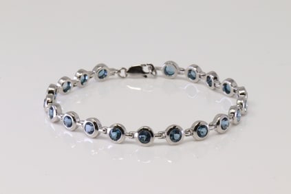 Blue Topaz Tennis Bracelet 14Kt.