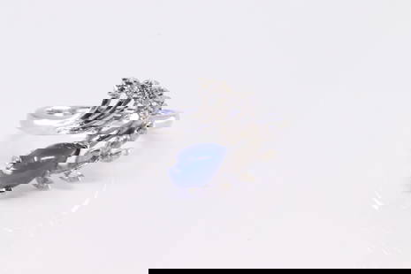 Star Sapphire & Diamond Ring 14Kt.: Ladies 14Kt Sapphire & Diamond Ring. Ring has one Pear Star Sapphire with 4 round Diamonds Ring size: 6.75. Total weight: 4.20 Grams.