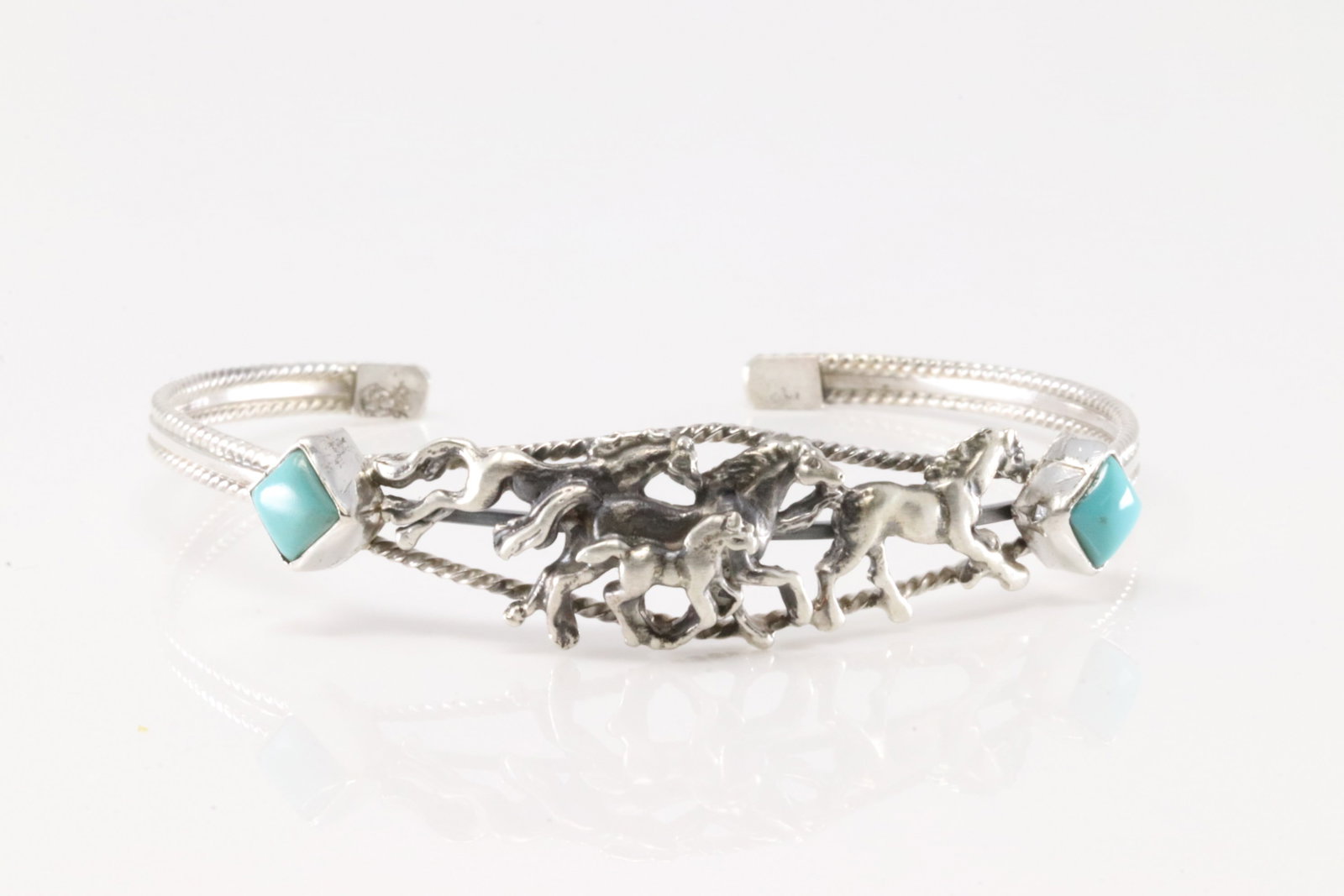 Native American Navajo Sterling Silver Turquoise Horses Bracelet Cuff By Bobby Platero.: This is a Native American Navajo Sterling Silver Turquoise Horses Bracelet Cuff By Bobby Platero.