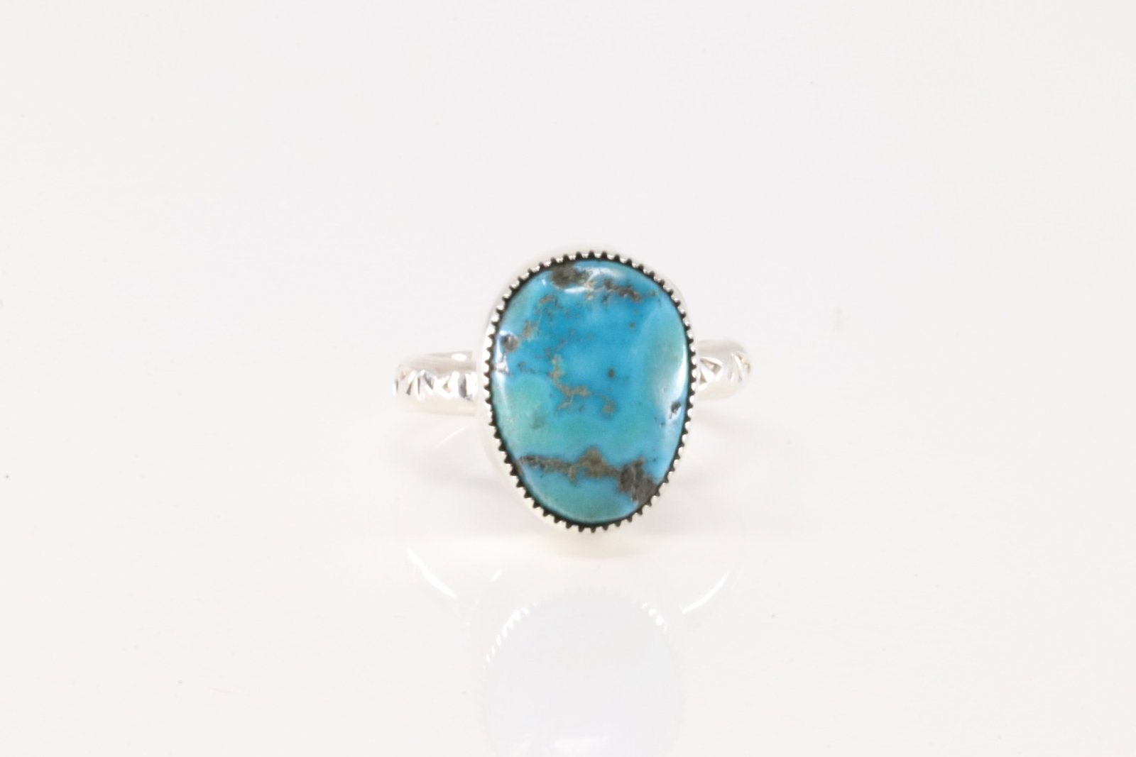Native America Navajo Sterling Silver Turquoise Ring By Amanda Larry.: This is a Native America Navajo Sterling Silver Turquoise Ring By Amanda Larry. Ring size: 7.50.