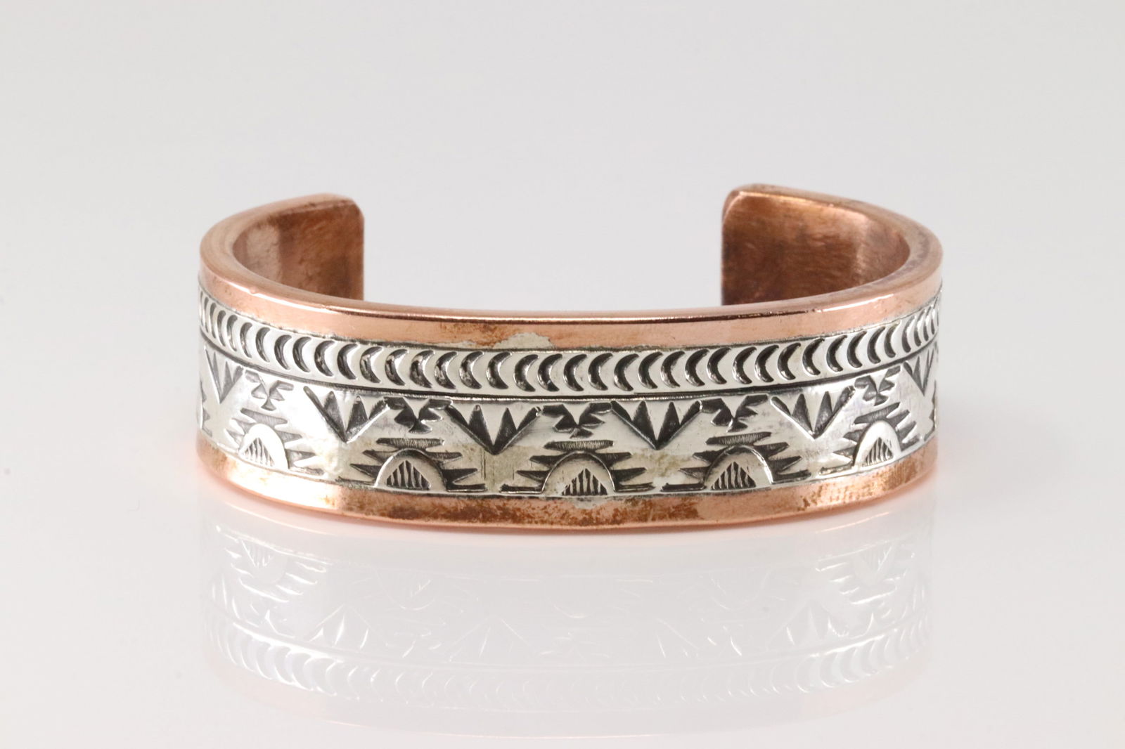 Native America Navajo Sterling Silver Copper Bracelet Cuff By Wylie Secatero.: This is a Native America Navajo Sterling Silver Copper Bracelet Cuff By Wylie Secatero.