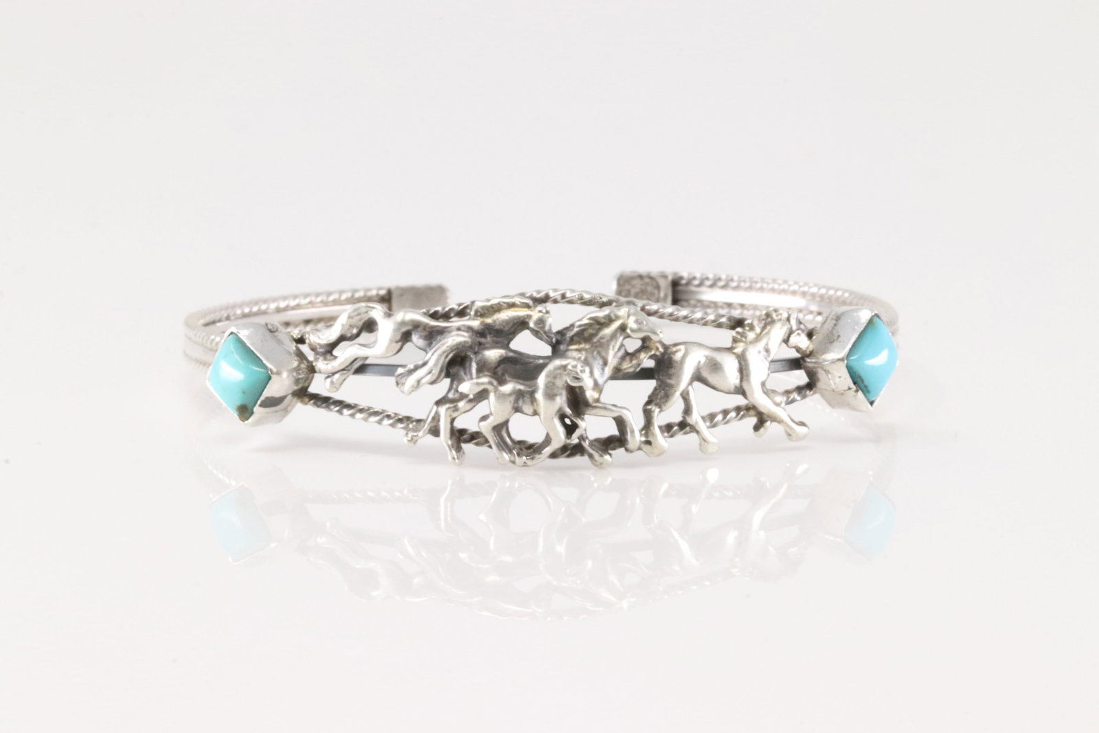 Native America Navajo Sterling Silver Turquoise Horse Bracelet Cuff By Bobby Platero.: This is a Native America Navajo Sterling Silver Turquoise Horse Bracelet Cuff By Bobby Platero.