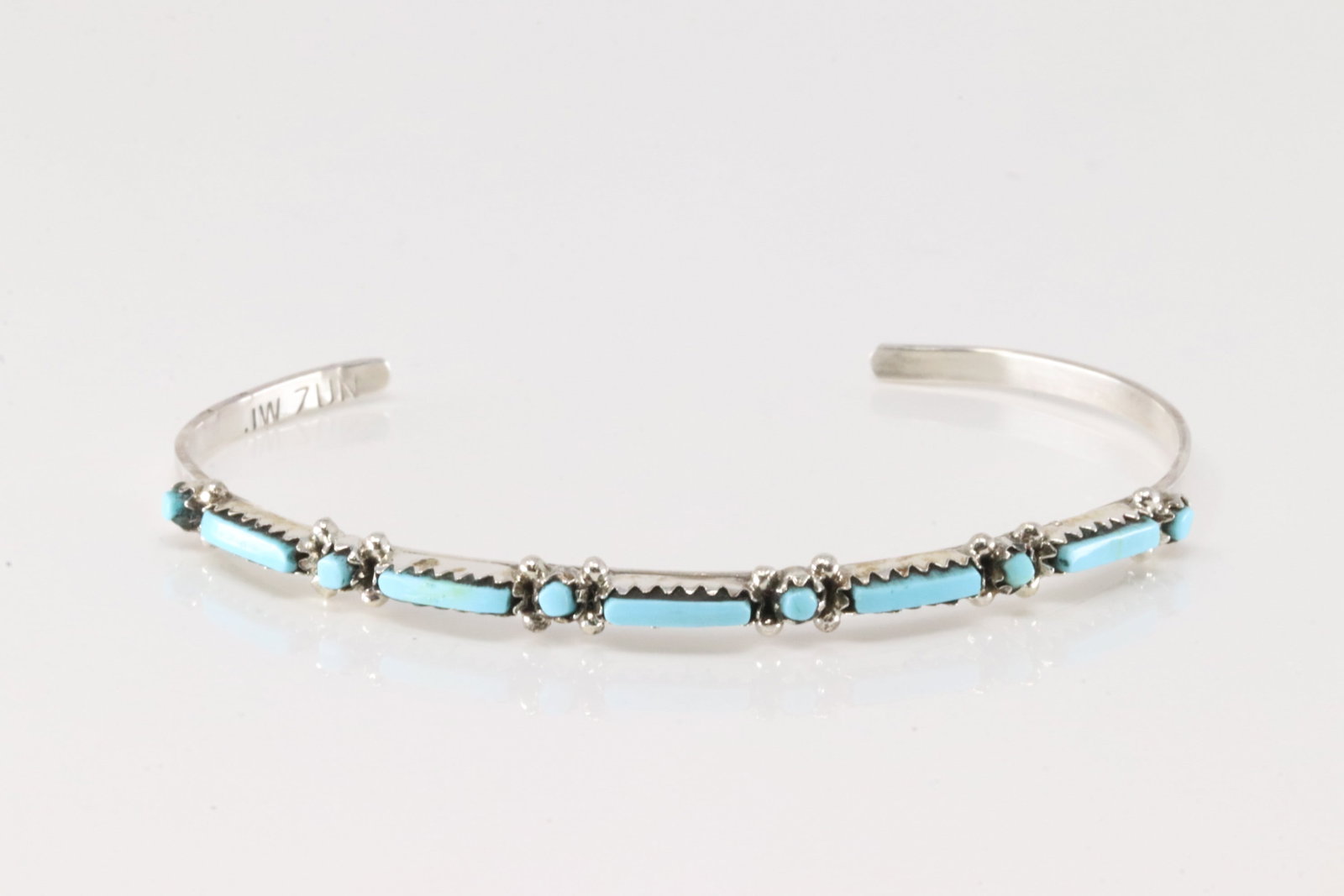 Native America Zuni Sterling Silver Turquoise Bracelet Cuff By J.W.: This is a Native America Zuni Sterling Silver Turquoise Bracelet Cuff By J.W.