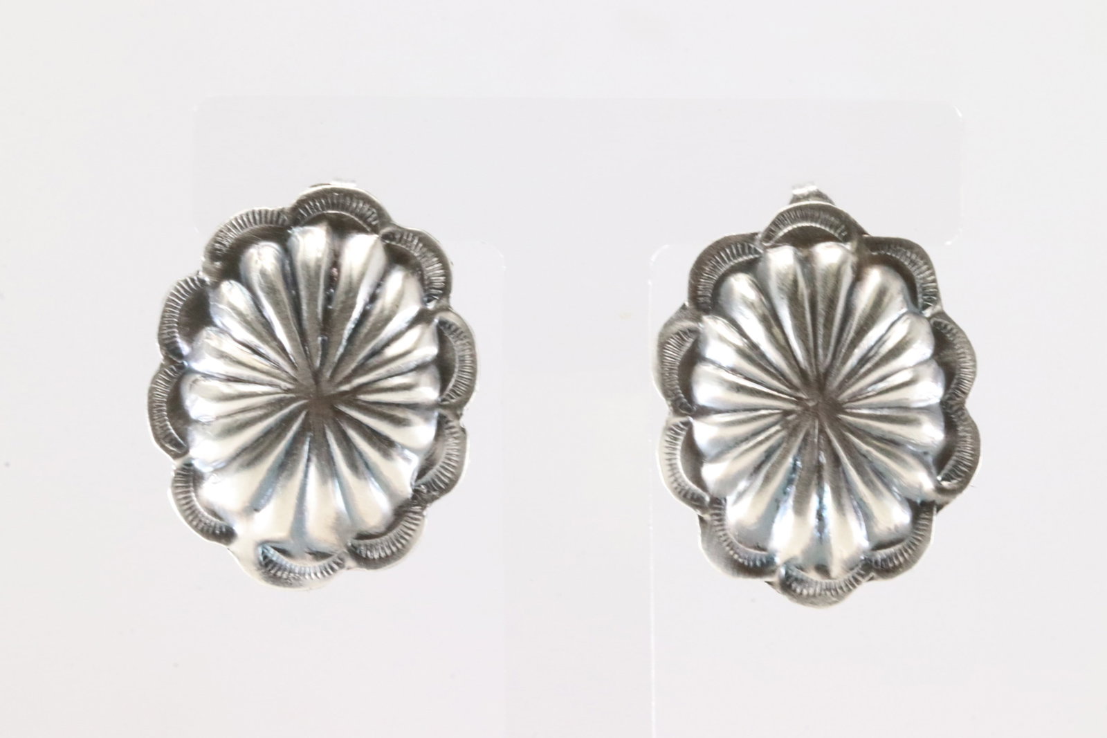 Native America Navajo Sterling Silver Conch Post Earring's By Joan & Ryan Begay.: This is a Native America Navajo Sterling Silver Conch Post Earring's By Joan & Ryan Begay.