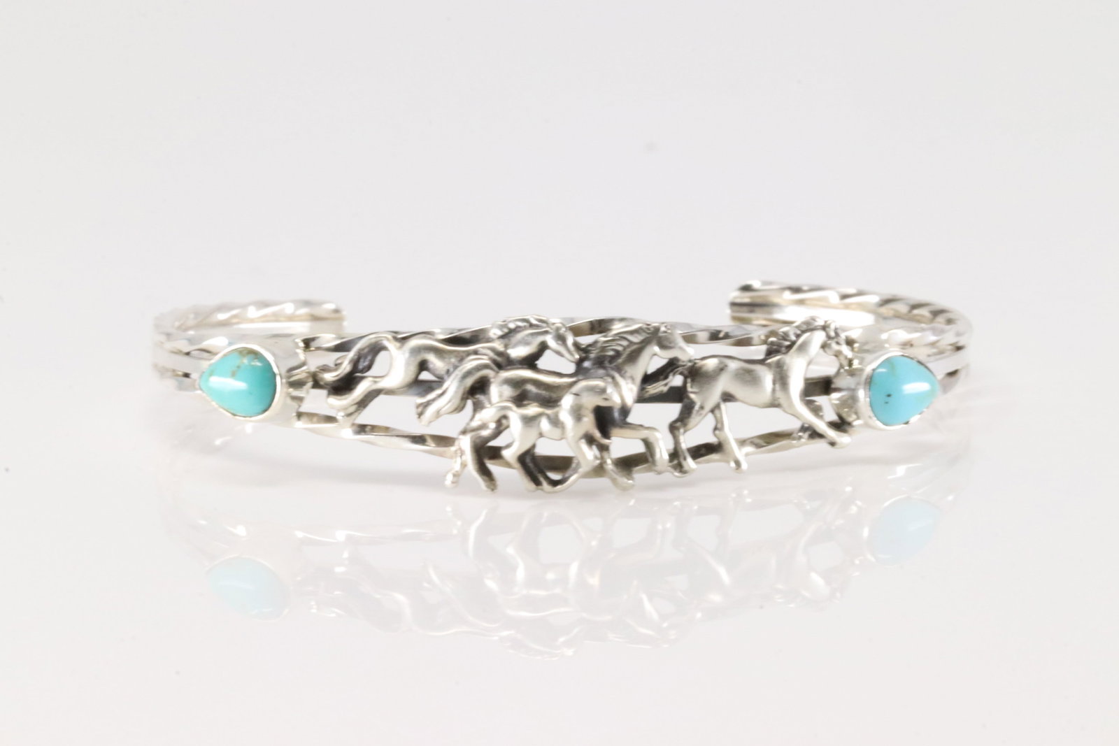 Native America Navajo Sterling Silver Turquoise Horse Bracelet Cuff By Bobby Platero.: This is a Native America Navajo Sterling Silver Turquoise Horse Bracelet Cuff By Bobby Platero.