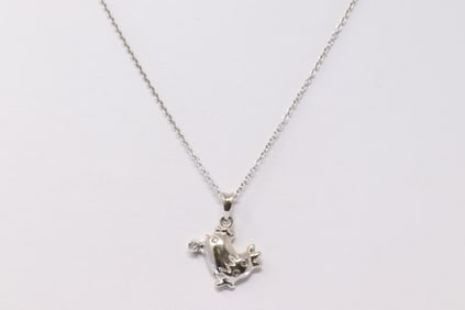 14kt White Gold Diamond animal Pendant.