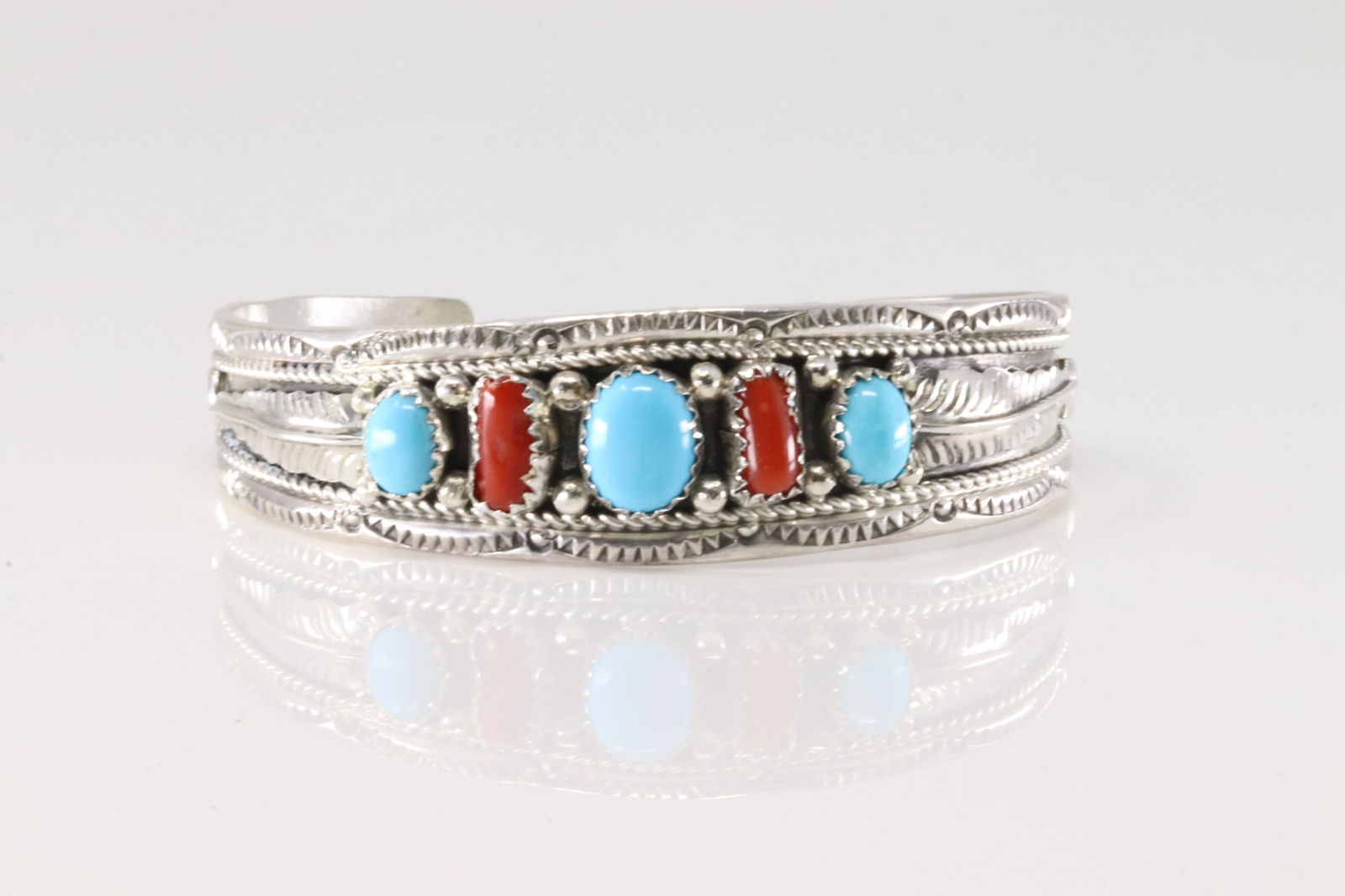 Native America Navajo Sterling Silver Coral & Turquoise Bracelet Cuff By Harrison & Betty Begay.: This is a Native America Navajo Sterling Silver Coral & Turquoise Bracelet Cuff By Harrison & Betty Begay.