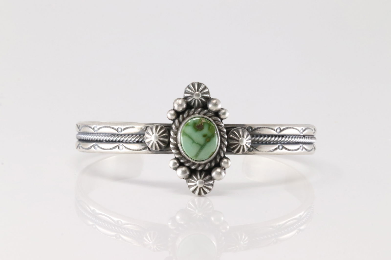 Native America Navajo Sterling Silver Turquoise Bracelet Cuff By M.C.: This is a Native America Navajo Sterling Silver Turquoise Bracelet Cuff By M.C.